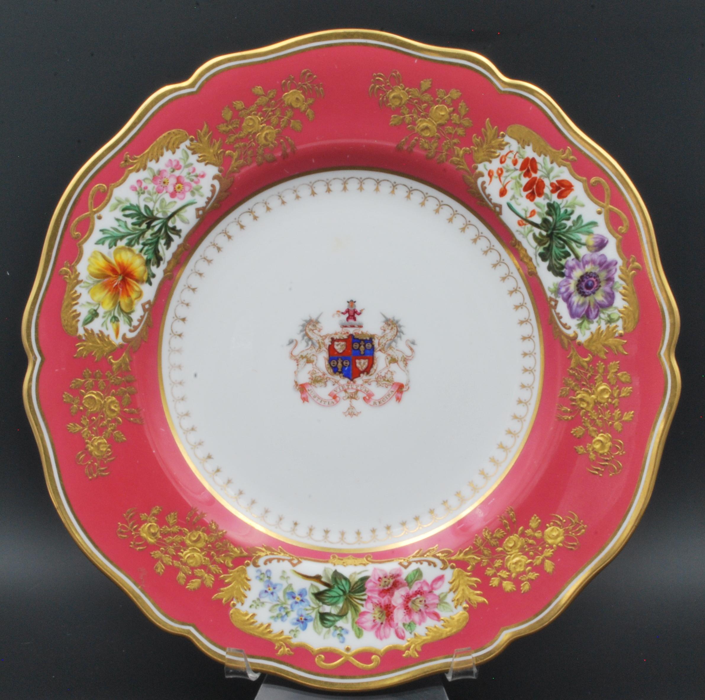 An exceptionally fine display plate, featuring the arms of The Goldsmith's Company. 

The plate is lavishly decorated. The pink ground is made using a compound of gold, and is the most expensive colour to be found on porcelain. On this will be