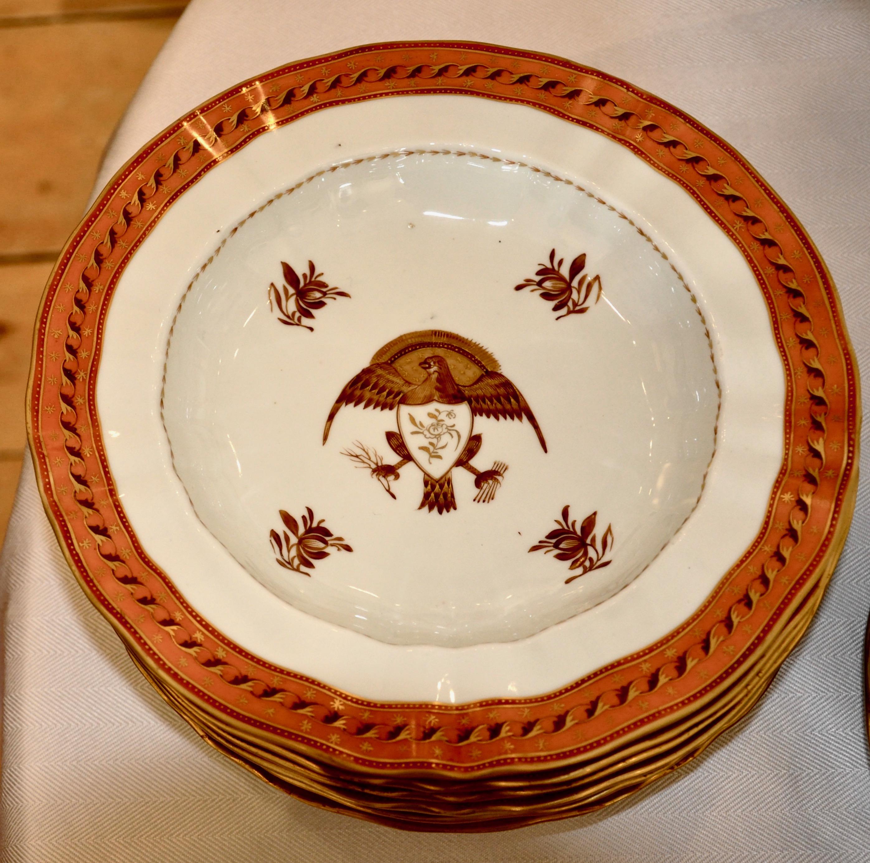 Partial set of Samson hand painted Chinese Export style porcelain for the American Market.

In beautiful orange trim with hand printed gilt motif. American eagle in centre with Shield. 20th century, in tones of rust and brown with gold accents