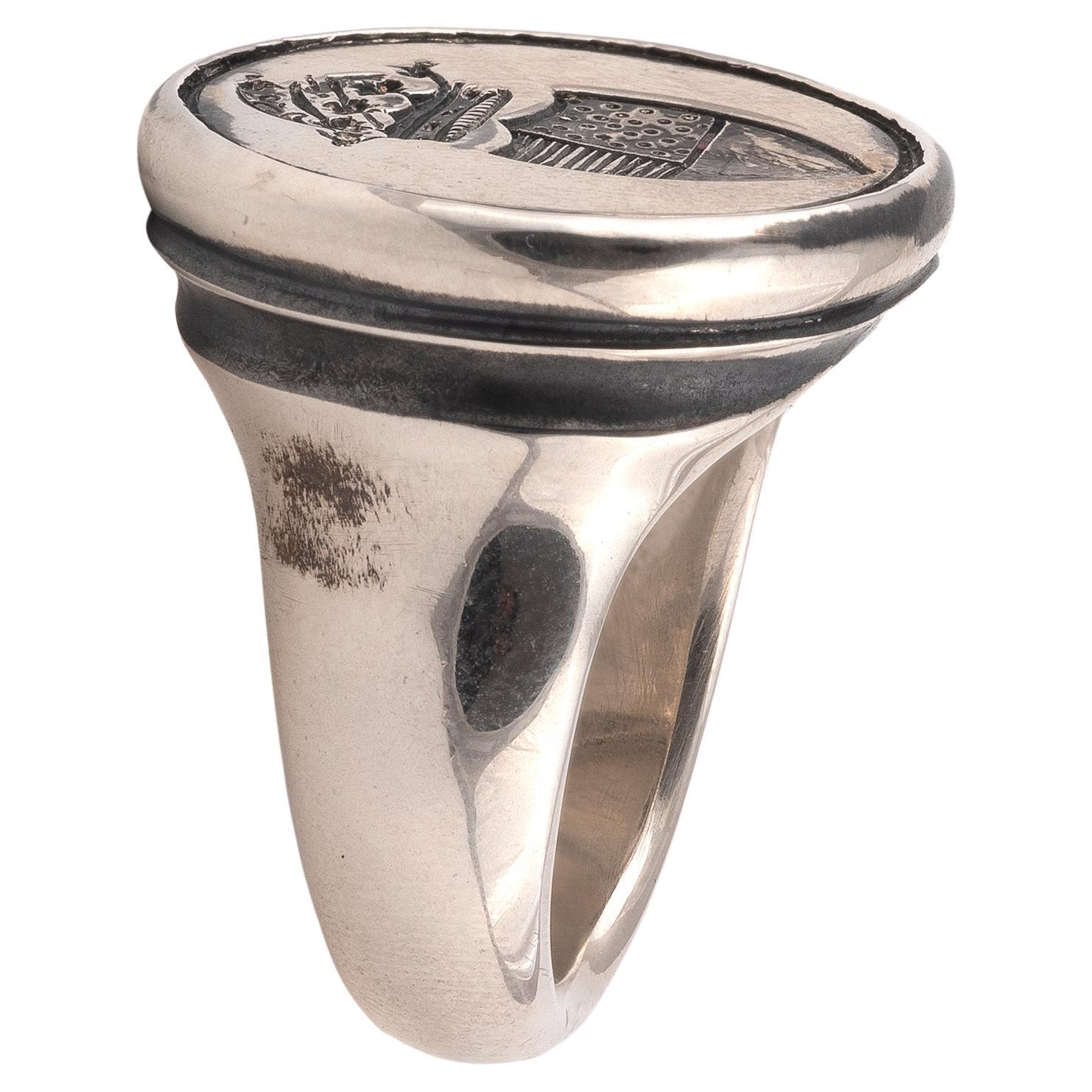 anillo con escudo de armas