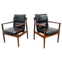 Arms chairs by Arne Vodder in Rosewood and leather