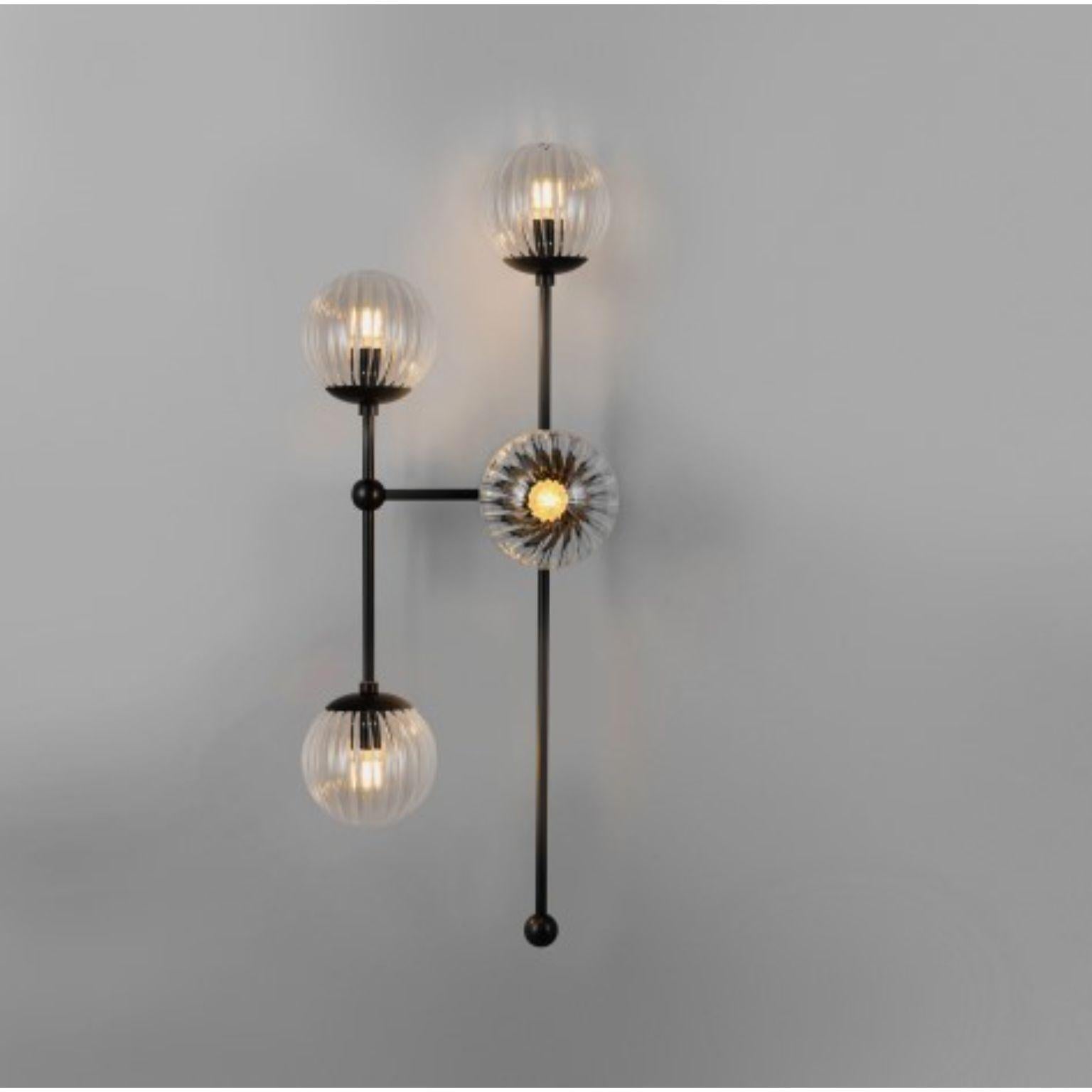 Armstrong 4 L wall sconce by Schwung
Dimensions: W 35.2 x D 33.1 x H 92.2 cm
Materials: Brass, Opal glass
Weight: 9 kg

Finishes available: Black gunmetal, polished nickel, brass
Other sizes available.

 Schwung is a german word, and loosely