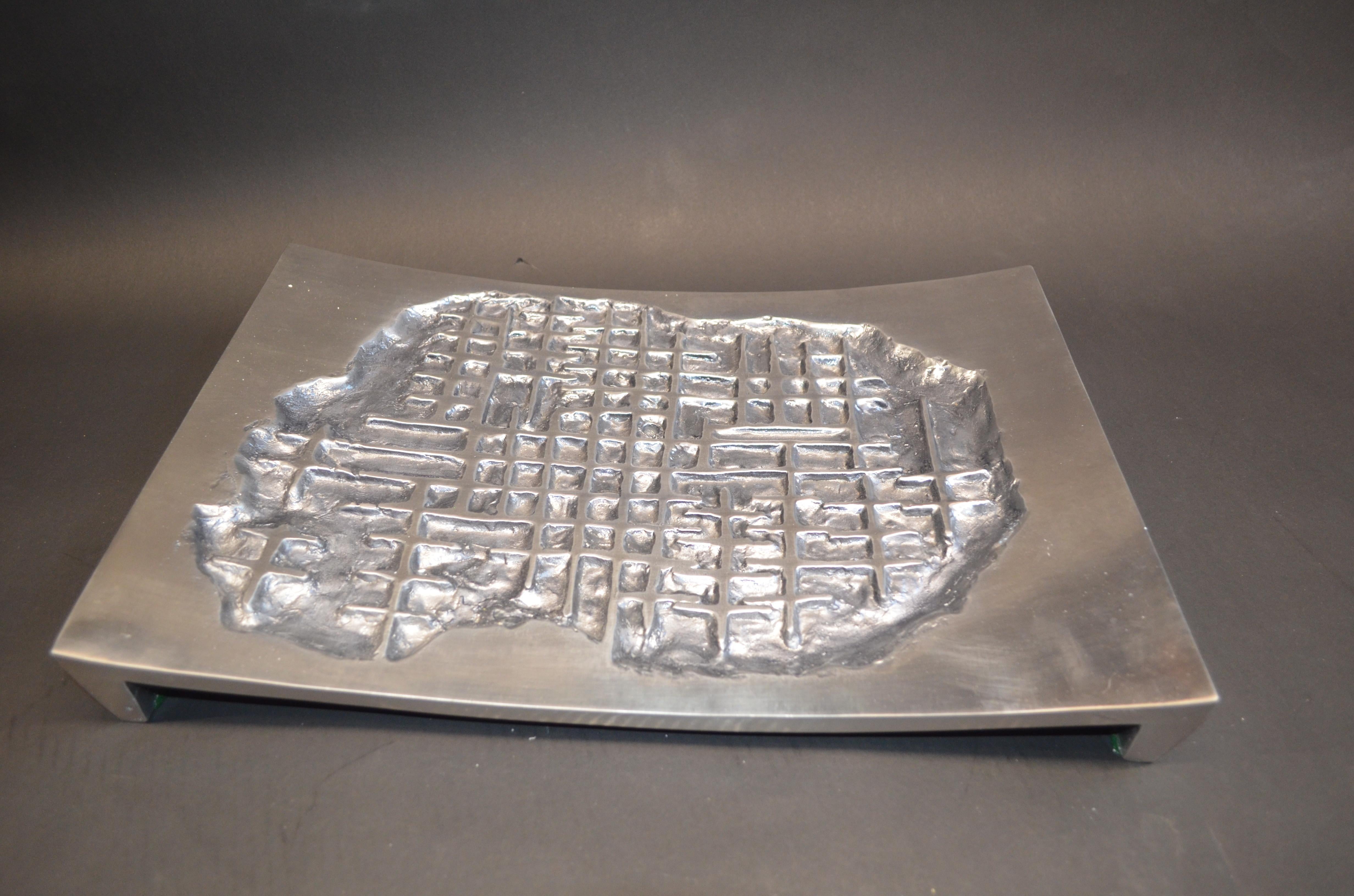 Cast aluminium tray, designed by Italian artist Arnaldo Gamba, carved signed and numbered, 2004, comes with its certificate.