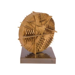 Arnaldo Pomodoro ( 1926 ) – gilded bronze sculpture with brass base – 1984