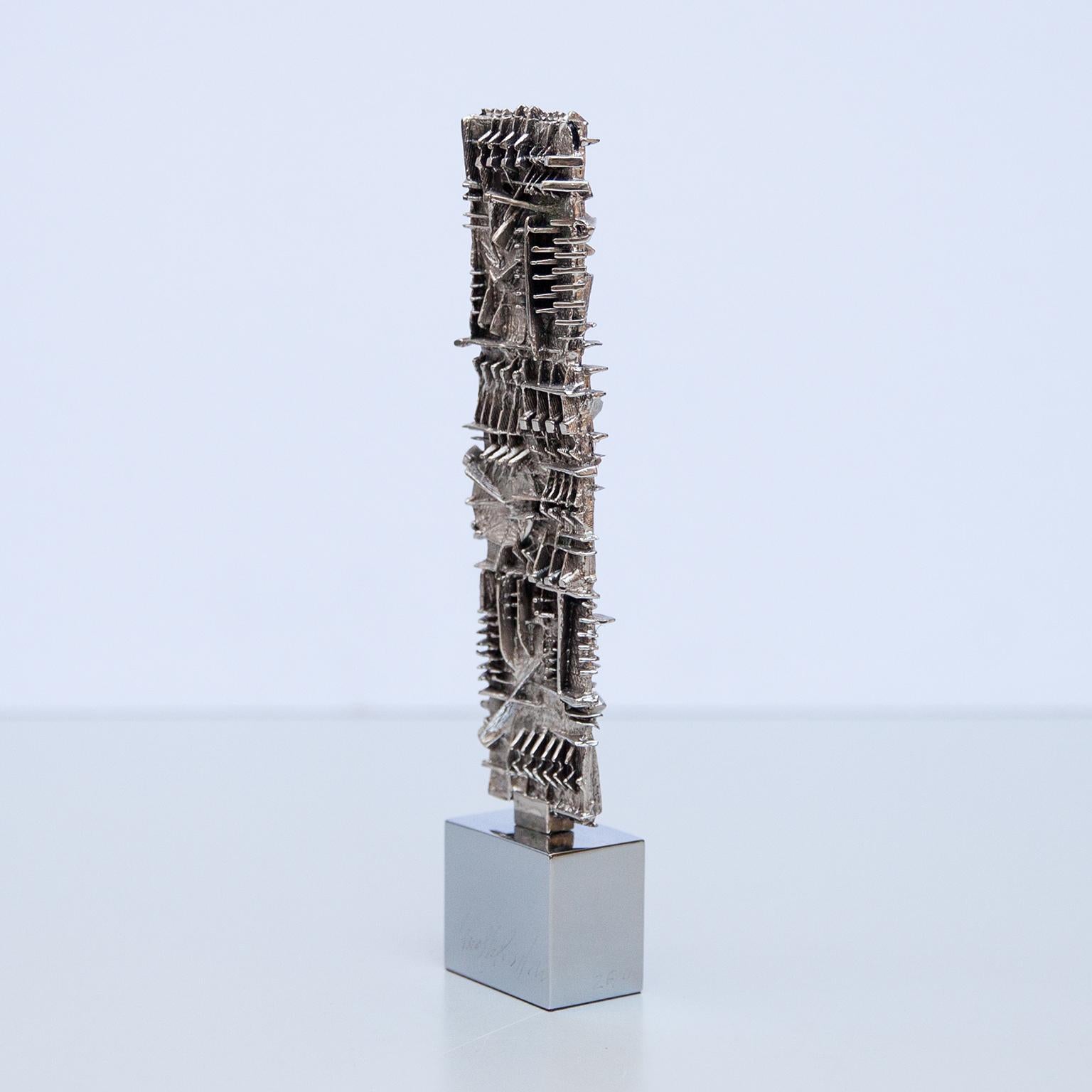 Arnaldo Pomodoro silver plated bronze Stele executed in an edition of 100 for the occasion of the press conference of Siemens in Rome 1986.

Signed and numbered 23/100.