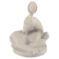 Arne Bang, ceramic sculpture of a fawn. Glaze in light sandy tones.