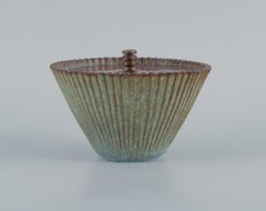 Arne Bang. Ceramic vase with lid in patinated brass. Mid-20th C.