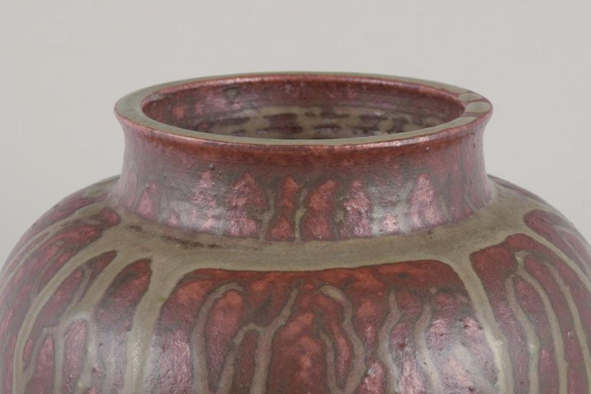 Glazed Arne Bang, own workshop. Large ceramic vase decorated in shades of brown. For Sale