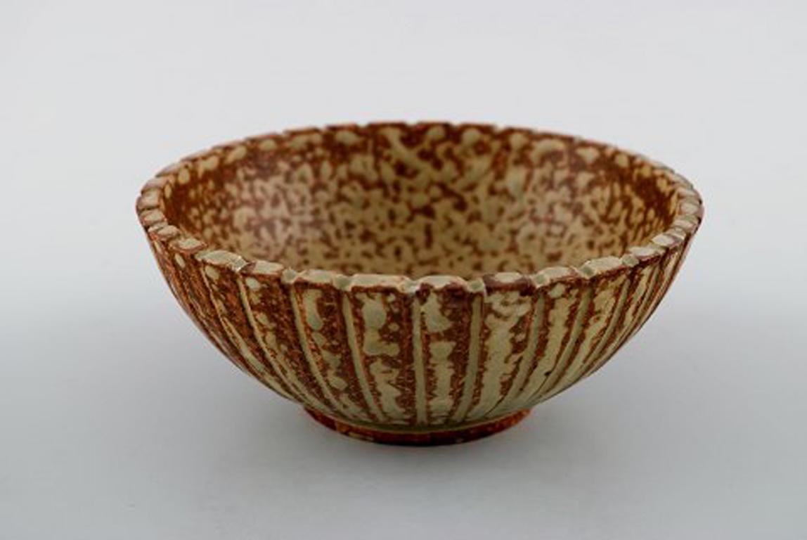 Arne bang pottery bowl.
Stamped AB.
Beautiful glaze in brown shades.
In very good condition.
Measures: Diameter 12.5 cm, height 5.5 cm.