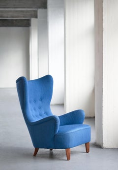 Arne Färnrot Wingback Chair in Blue Wool Fabric and Mahogany, Sweden, Late 1940s