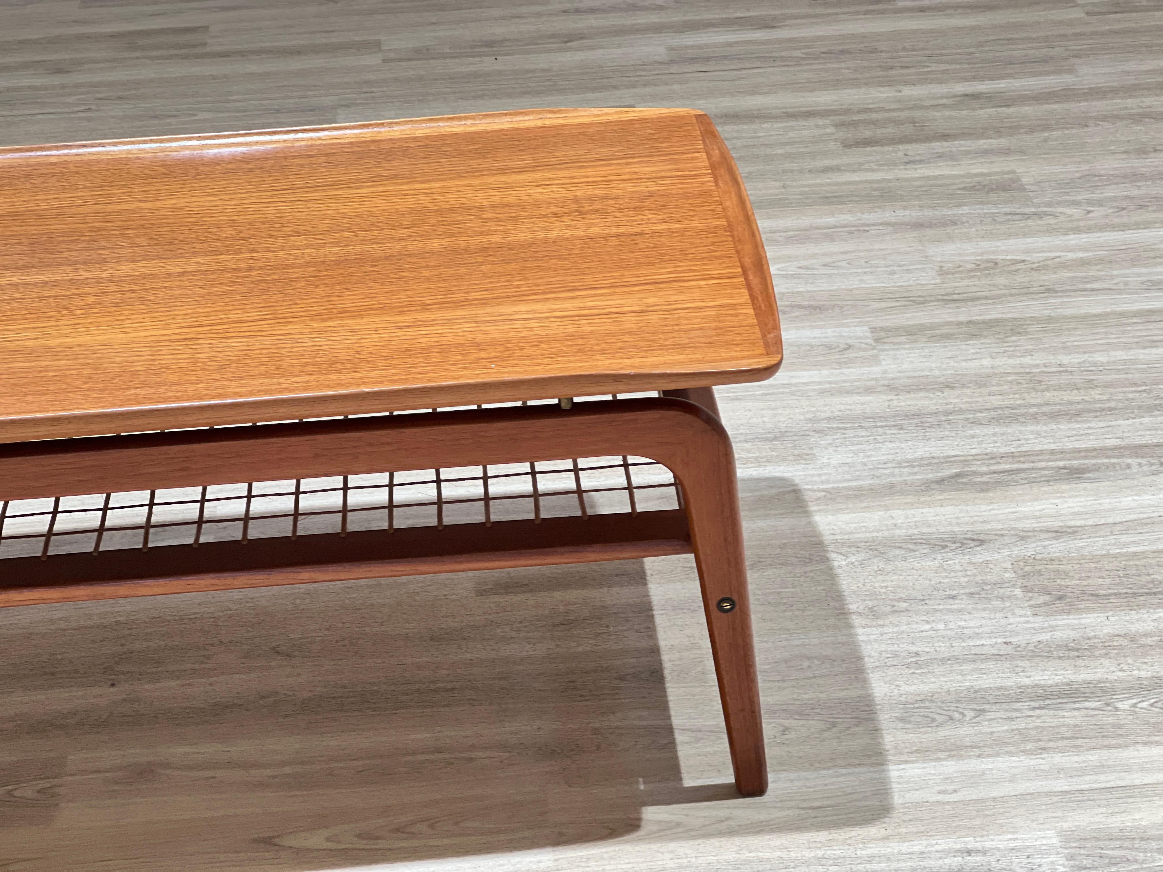 Mid-Century Modern Arne Hovmand-Olsen coffee table with a rattan rack