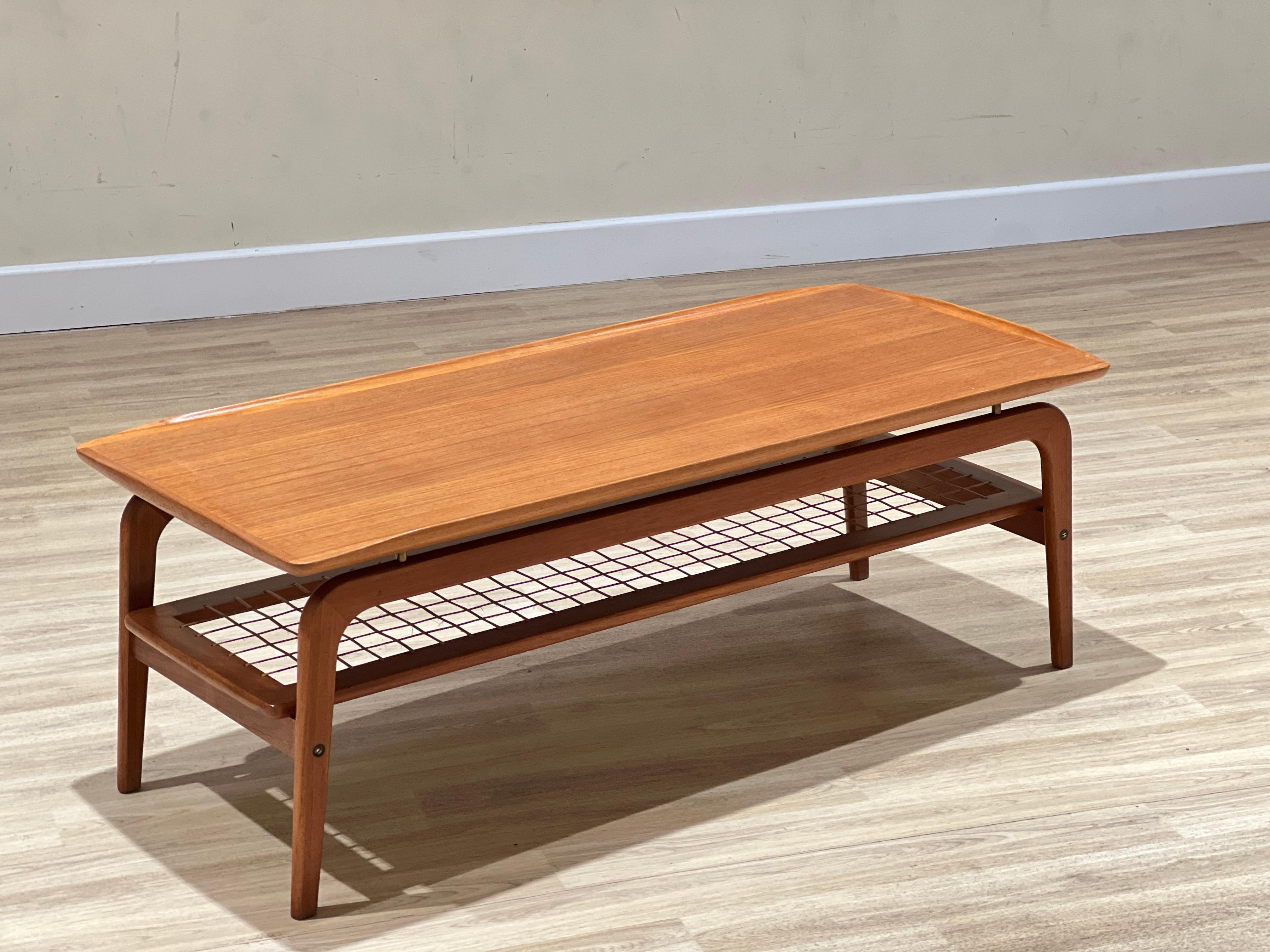 20th Century Arne Hovmand-Olsen coffee table with a rattan rack