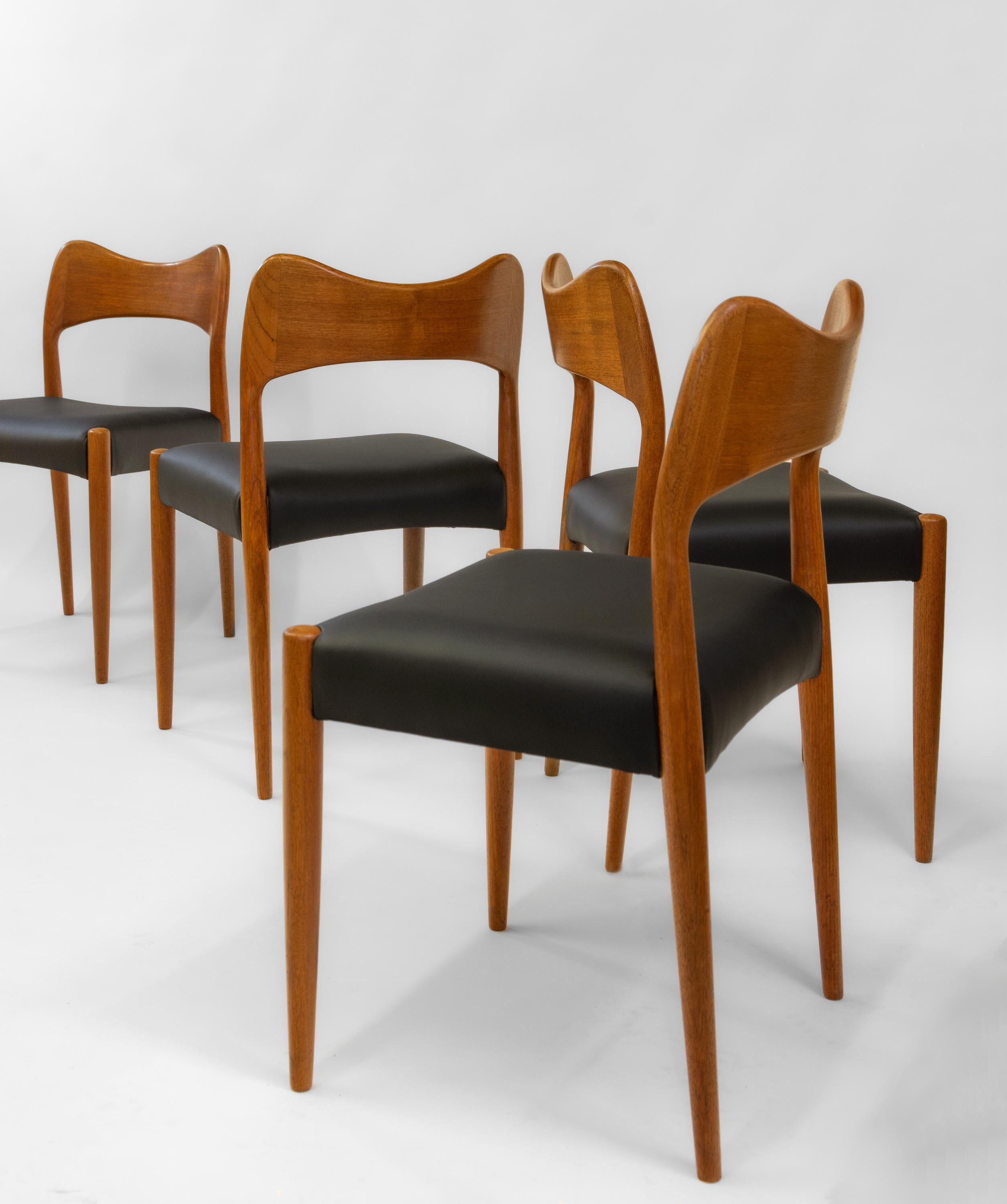 Arne Hovmand Olsen Set of Four Teak  & Leather Dining Chairs. Danish - Circa 1960.

The chairs have sculptural curved backs, and the teak frames are in very good condition. There are a few marks where the chairs have rested against a table. The