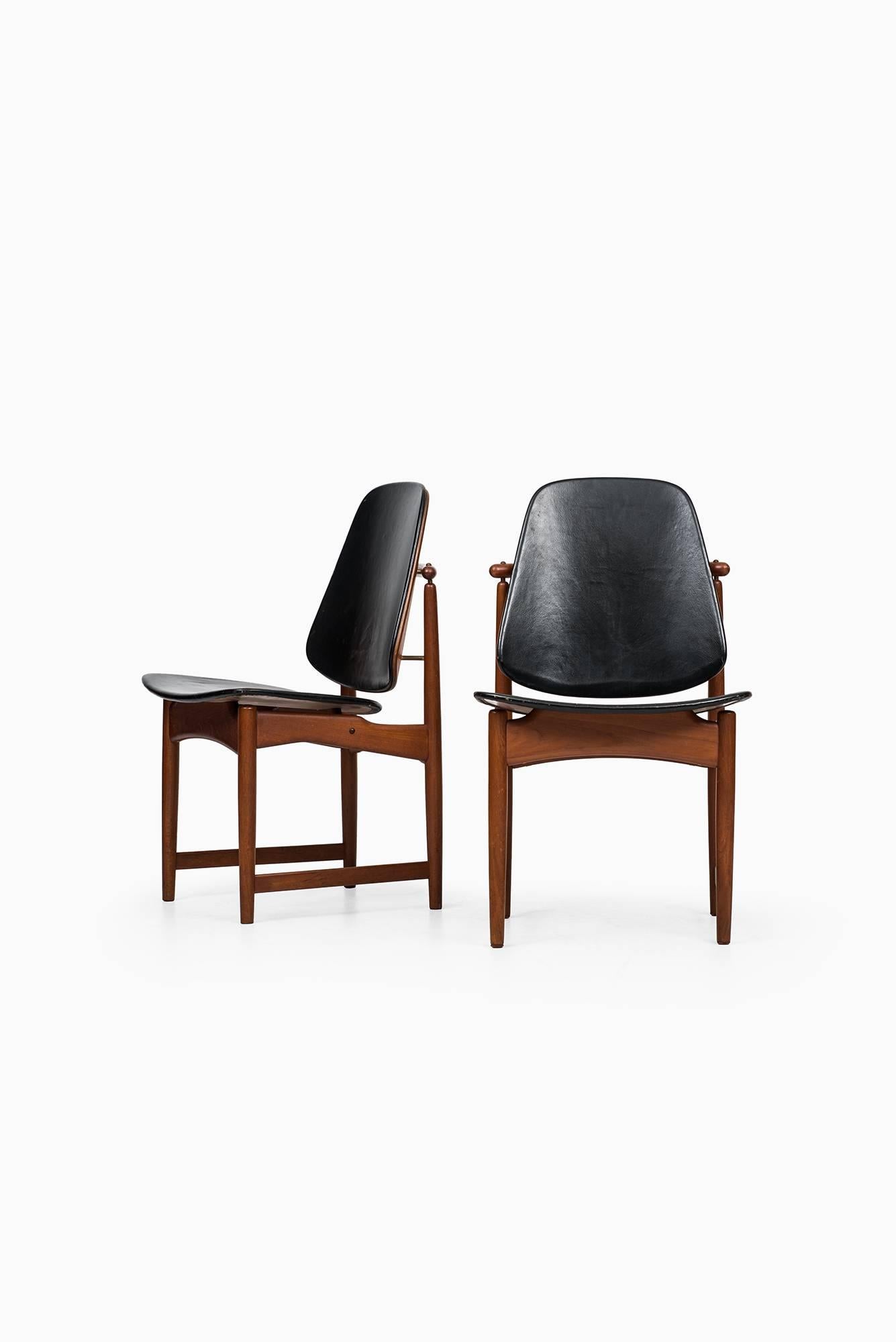 Rare set of eight dining chairs designed by Arne Hovmand-Olsen. Produced by Onsild Møbelfabrik for Jutex, Århus in Denmark.