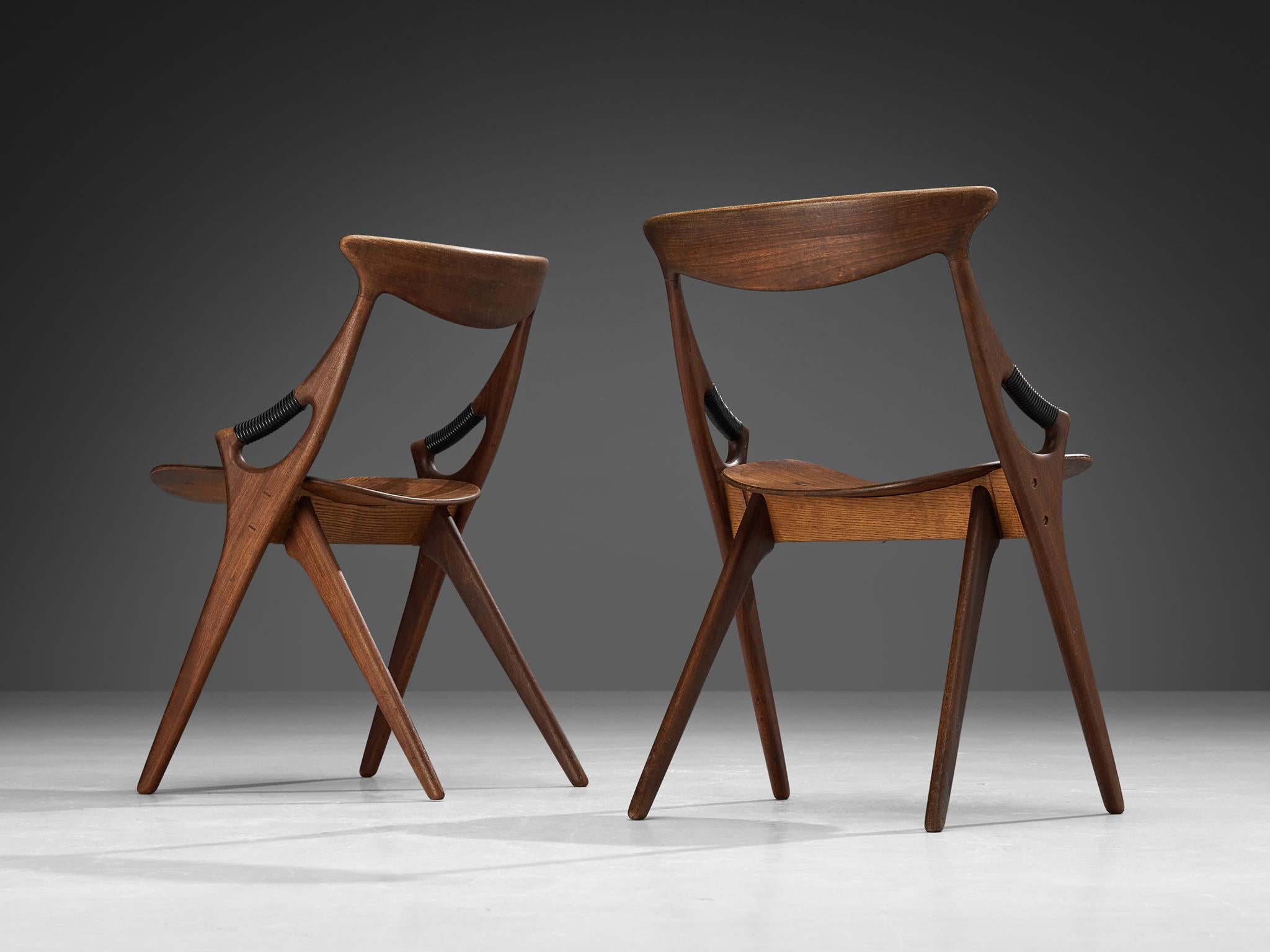 Arne Hovmand-Olsen for Mogens Kold Møbelfabrik, dining chairs, model 71, mahogany, brass, Denmark, 1959 

This sculptural set of dining chairs is designed by the Dane Arne Hovmand-Olsen for Mogens Kold Møbelfabrik. The chairs are organic in their
