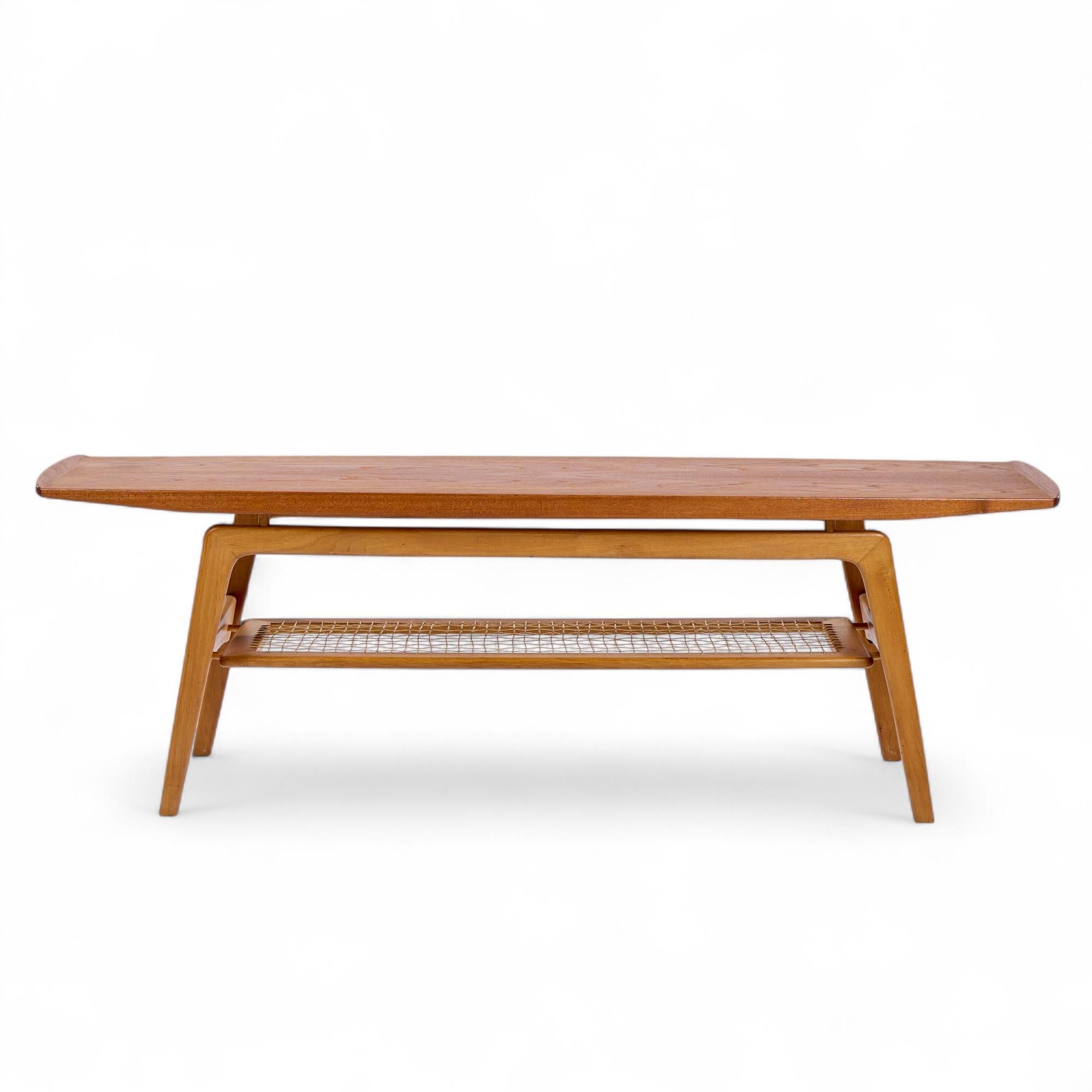 Arne Hovmand Olsen Mid Century Danish Teak Coffee Table

This coffee table measures: 59 wide x 19.25 deep x 19 inches high

All pieces of furniture can be had in what we call restored vintage condition. That means the piece is restored upon purchase