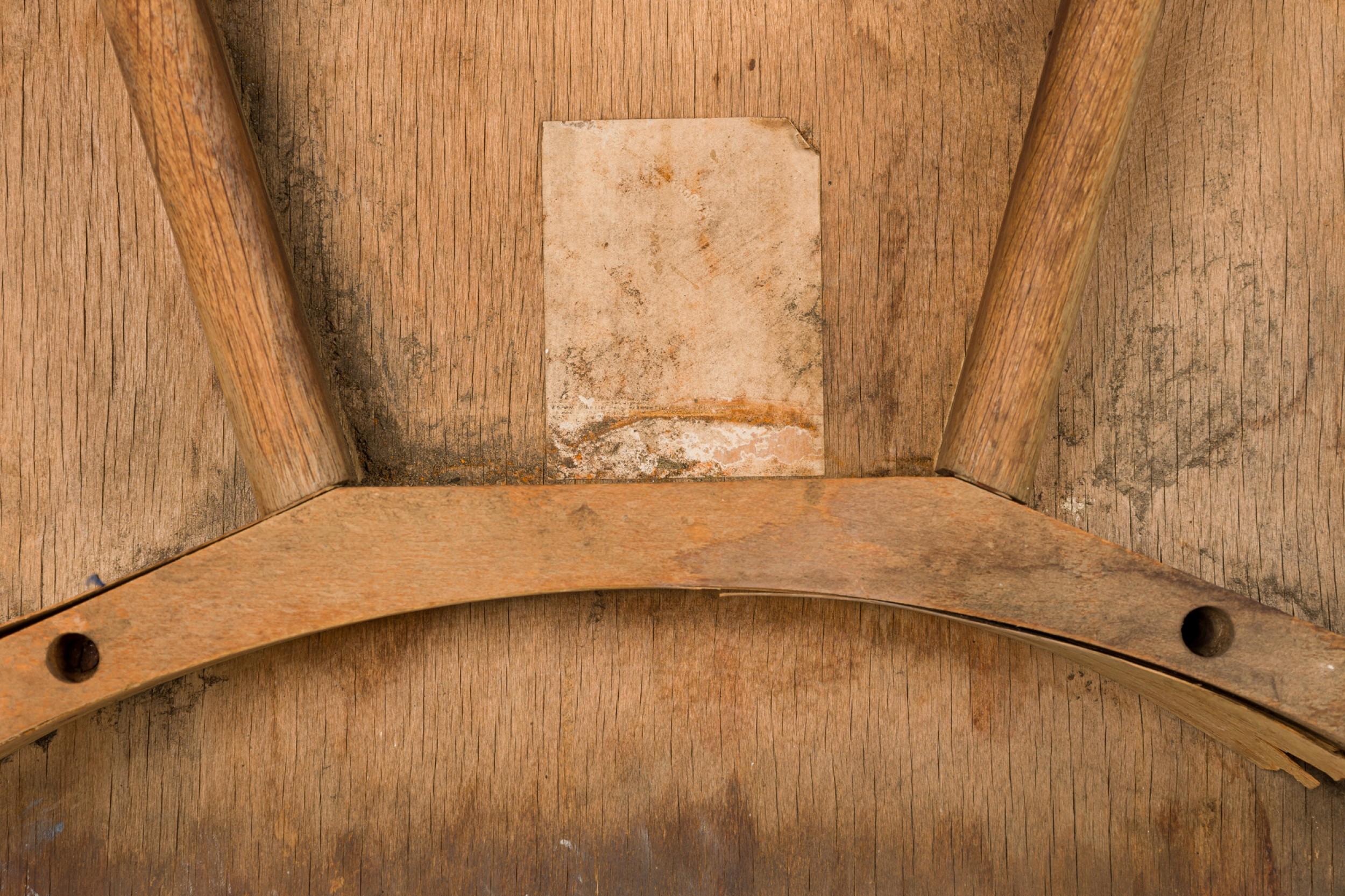 Mid-Century Danish wooden dining chair in a curved organic style and functional form with a potato chip seat, standing on domed feet. (ARNE HOVMAND-OLSEN)

Loose leg, some wood splits on underside