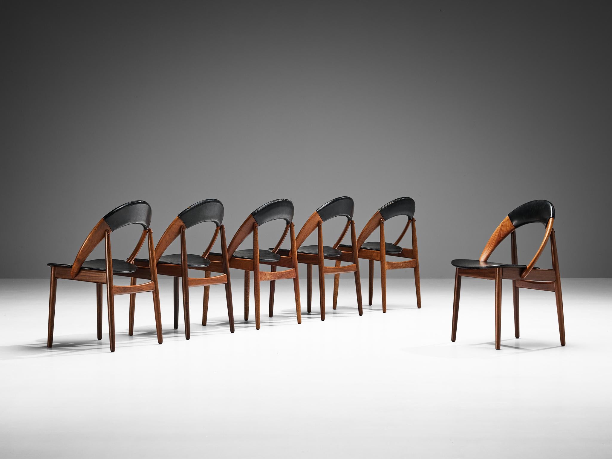 Arne Hovmand-Olsen dining chairs, teak, leatherette, Denmark, 1960s 

Set of six dining chairs designed by the Danish designer Arne Hovmand-Olsen. The chairs have a very simple and organic design. The rounded back turns into the armrest and seating