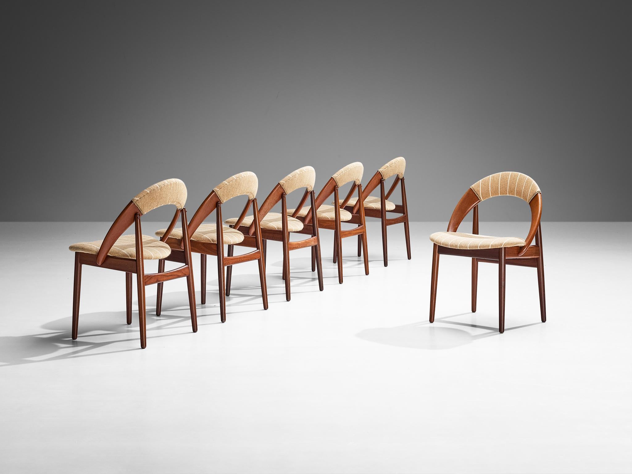 Arne Hovmand-Olsen, set of six dining chairs, teak, fabric, Denmark, 1960s 

A set of six dining chairs meticulously designed by Danish designer Arne Hovmand-Olsen. These chairs showcase a remarkably simple and organic design, where the rounded back