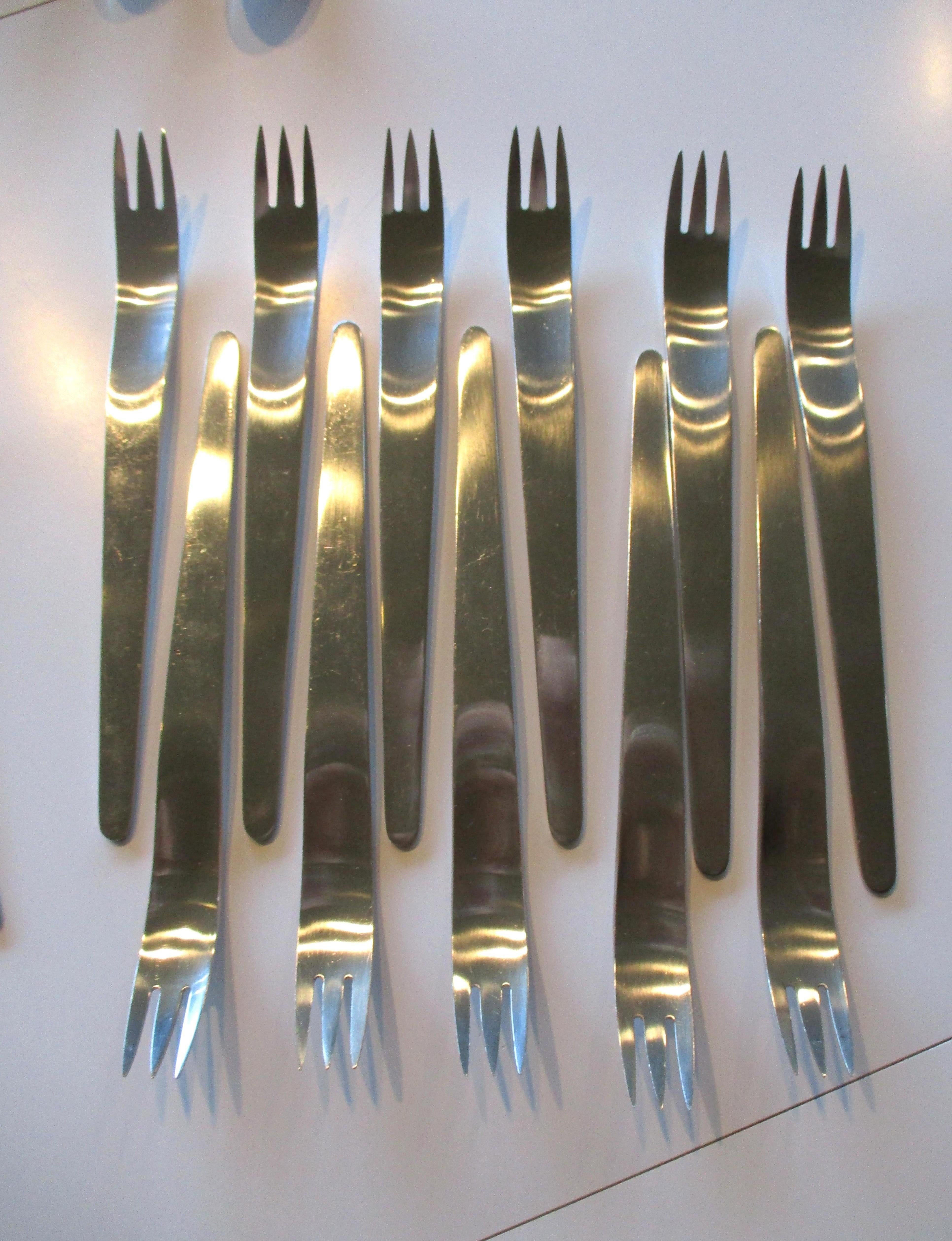 Danish Arne Jacobsen 12 Place settings AJ Flatware Set 75pcs. A. Michelsen Denmark For Sale