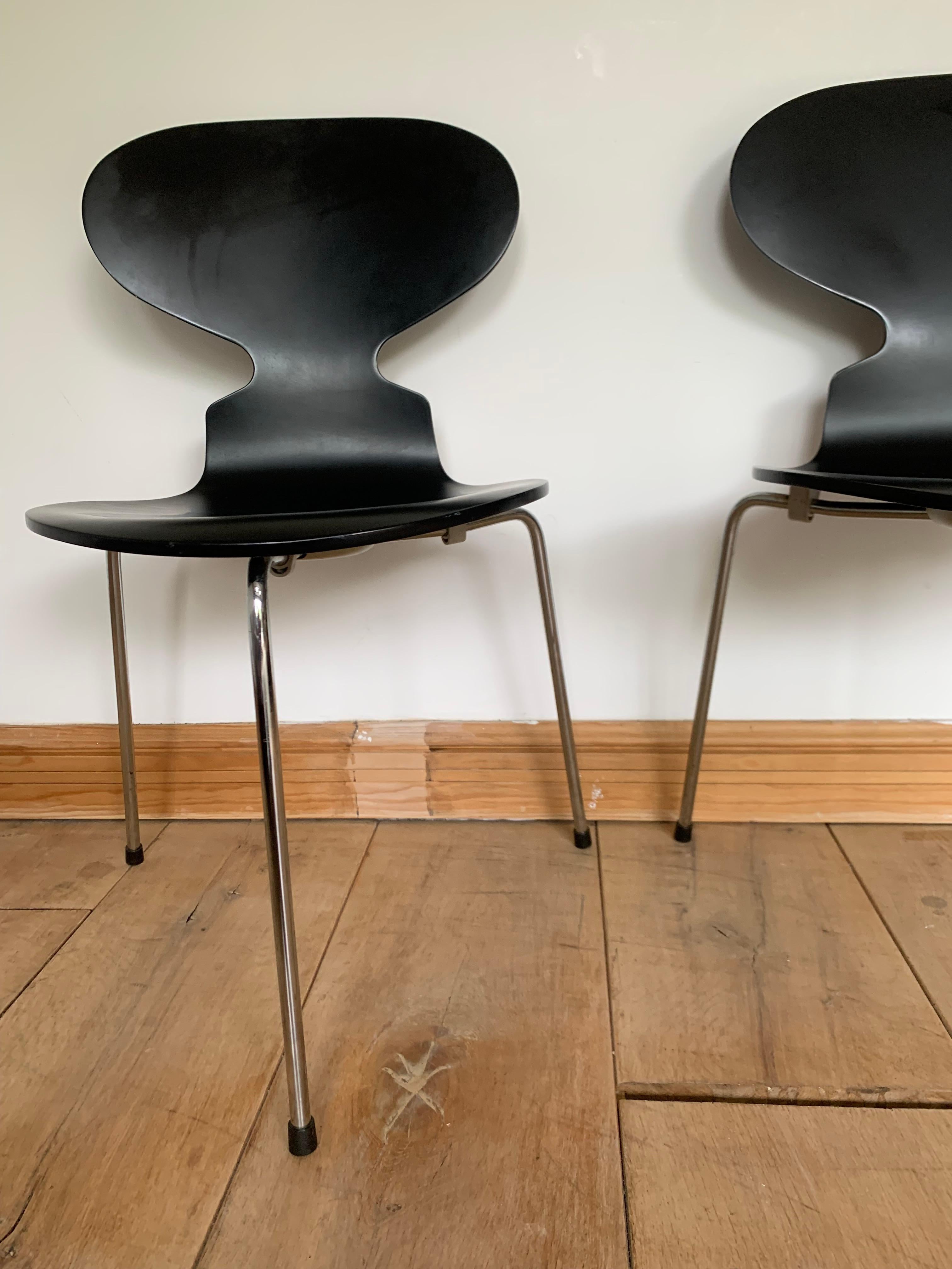 Original eye-catching Arne Jacobsen black three legged Ant chair.
The Ant chair is a classic of modern chair design. It was designed in 1952 by Arne Jacobsen for use in the canteen of the Danish pharmaceutical firm Novo Nordisk. The Ant was named