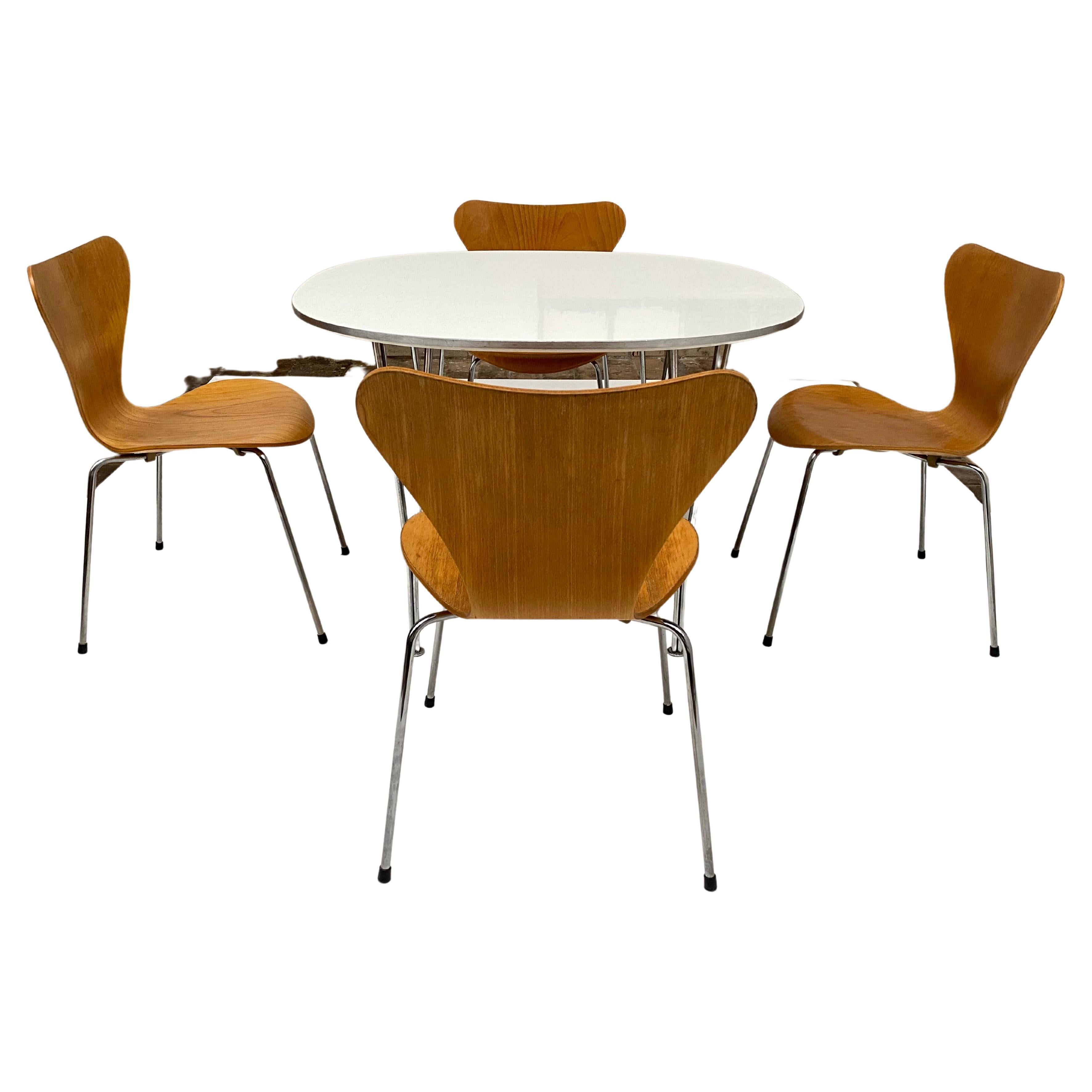 Nice matching dining set produced by Fritz Hansen in 1990

4 seven series 'butterfly' dining chair by Arno Jacobsen with a complementing dining table by Piet Hein & Bruno Mathsson for Fritz Hansen of Denmark

Produced in 1990 everlasting