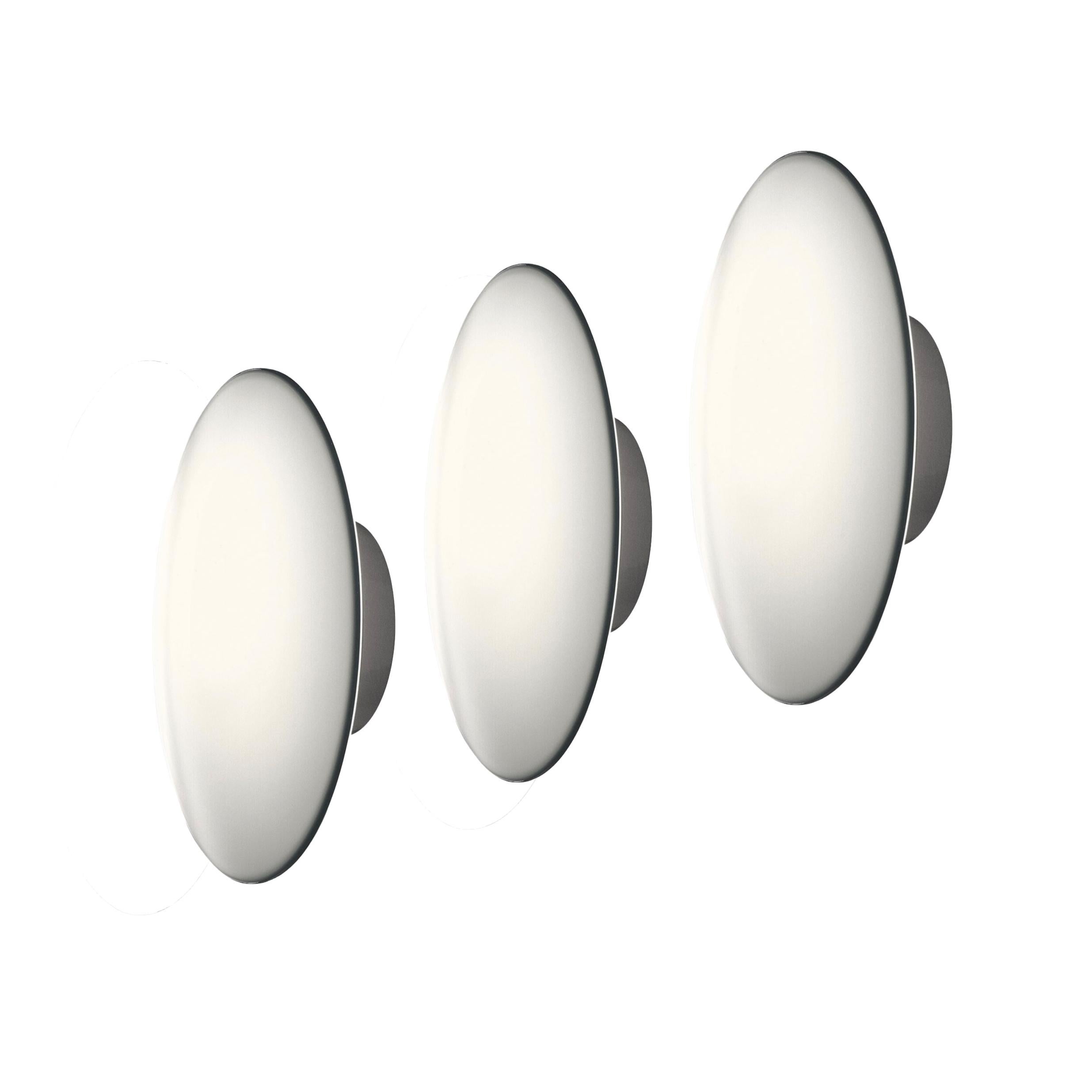 Arne Jacobsen 'AJ Eklipta' 450 Wall Lamp Set of 3 for Louis Poulsen. Designed in 1959. New, current production.

AJ Eklipta was designed by Arne Jacobsen in 1959 for Rødovre Town Hall. Two different sizes were produced for this project – 350 mm and