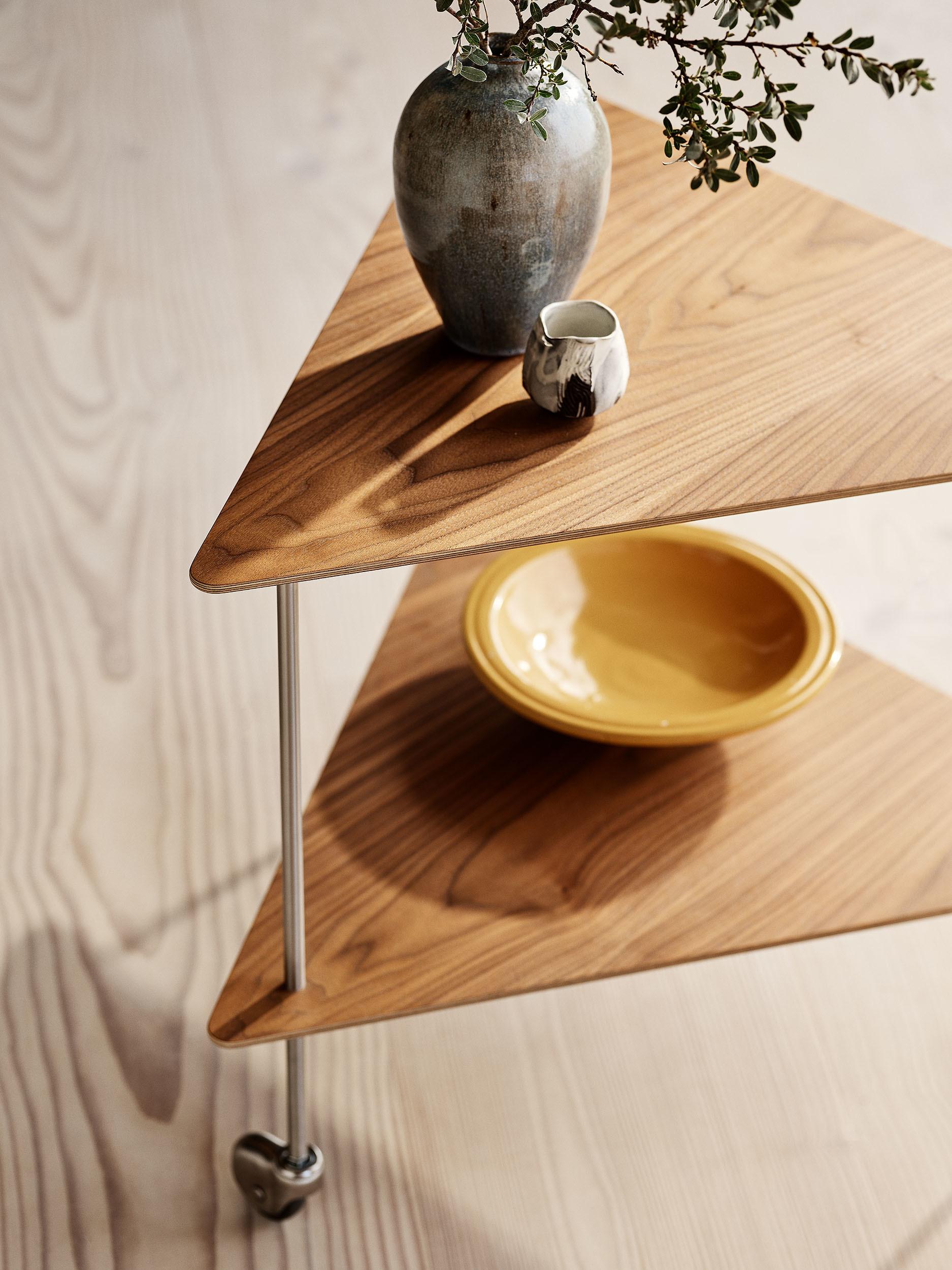 Arne Jacobsen 'AJ Trolley' for Fritz Hansen in Walnut.

Established in 1872, Fritz Hansen has become synonymous with legendary Danish design. Combining timeless craftsmanship with an emphasis on sustainability, the brand’s re-editions of iconic