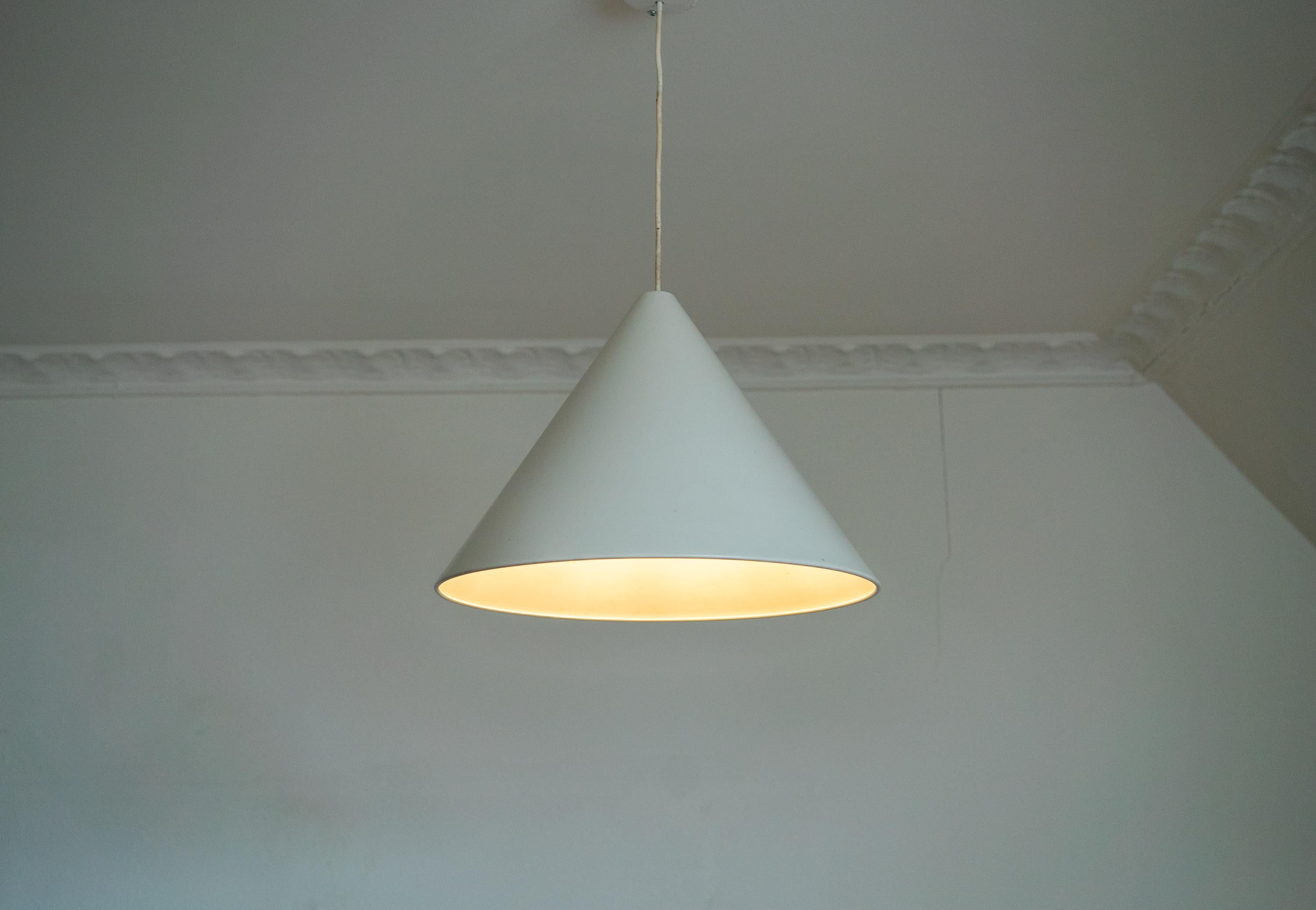 Large white  Arne Jacobsen Billiard hanging lamp designed by Arne Jacobsen for Louis Poulsen in the 1960s. These lamps provide direct down light and are often used for above billiard tables. The condition is still very good and the wiring has been