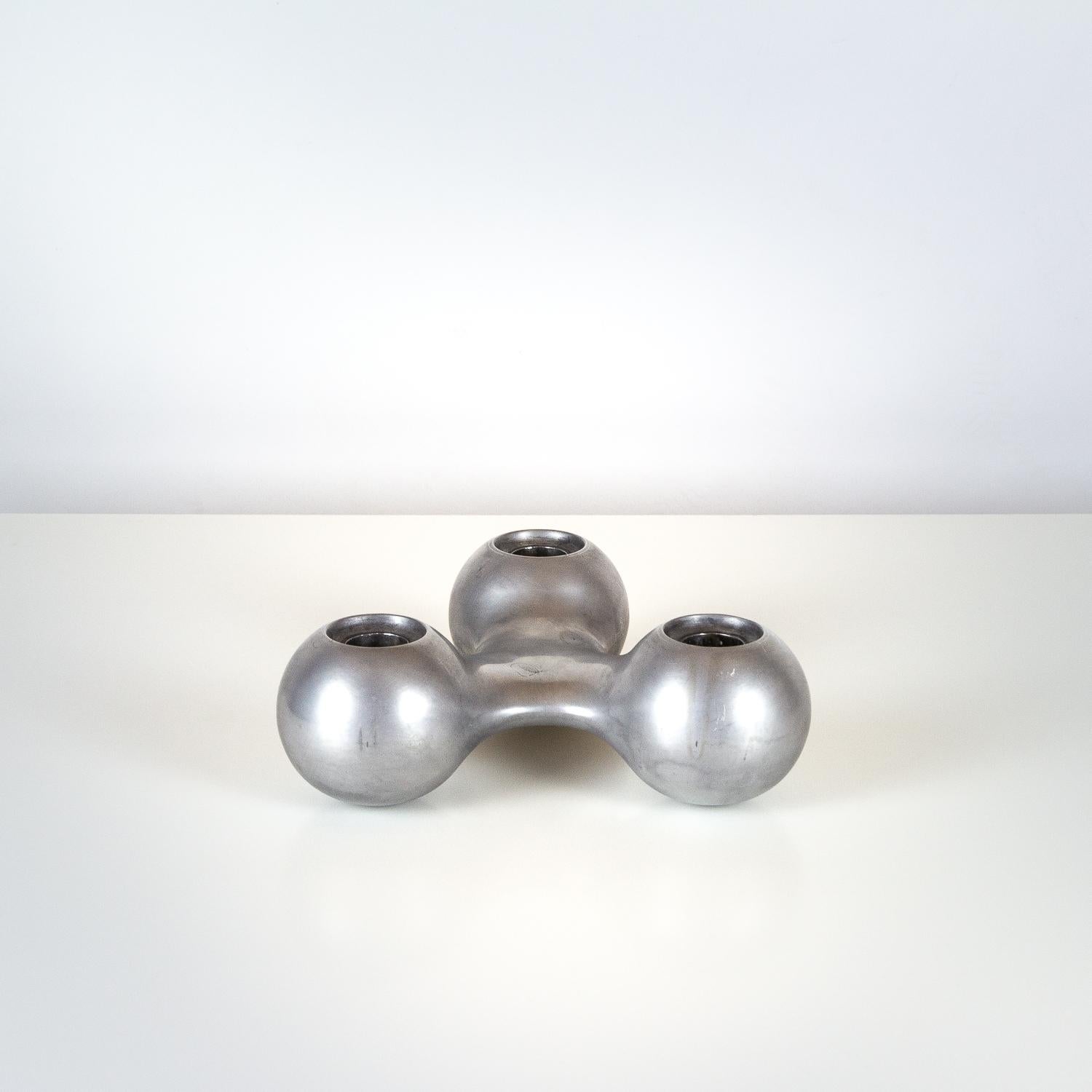 Georg Jensen candleholder designed by Arne Jacobsen. This unusual matte-finish version was made for Aarhus Rådhus (town hall) in Denmark which Jacobsen designed with Erik Møller in 1937. Stamped with maker’s mark and Aarhus city crest. Wear and