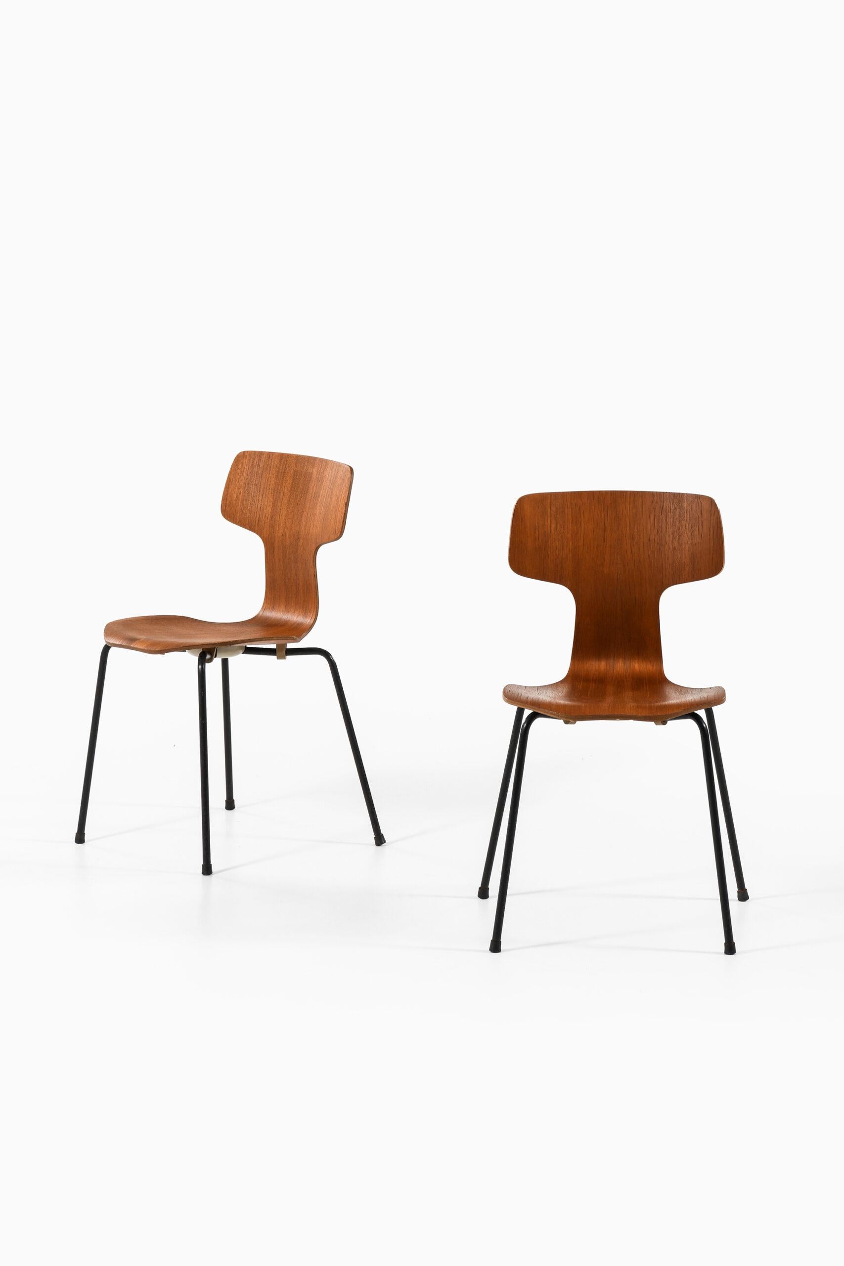 Rare ensemble de 9 chaises de salle à manger modèle 3103 / T conçu par Arne Jacobsen. Produit par Fritz Hansen au Danemark.
