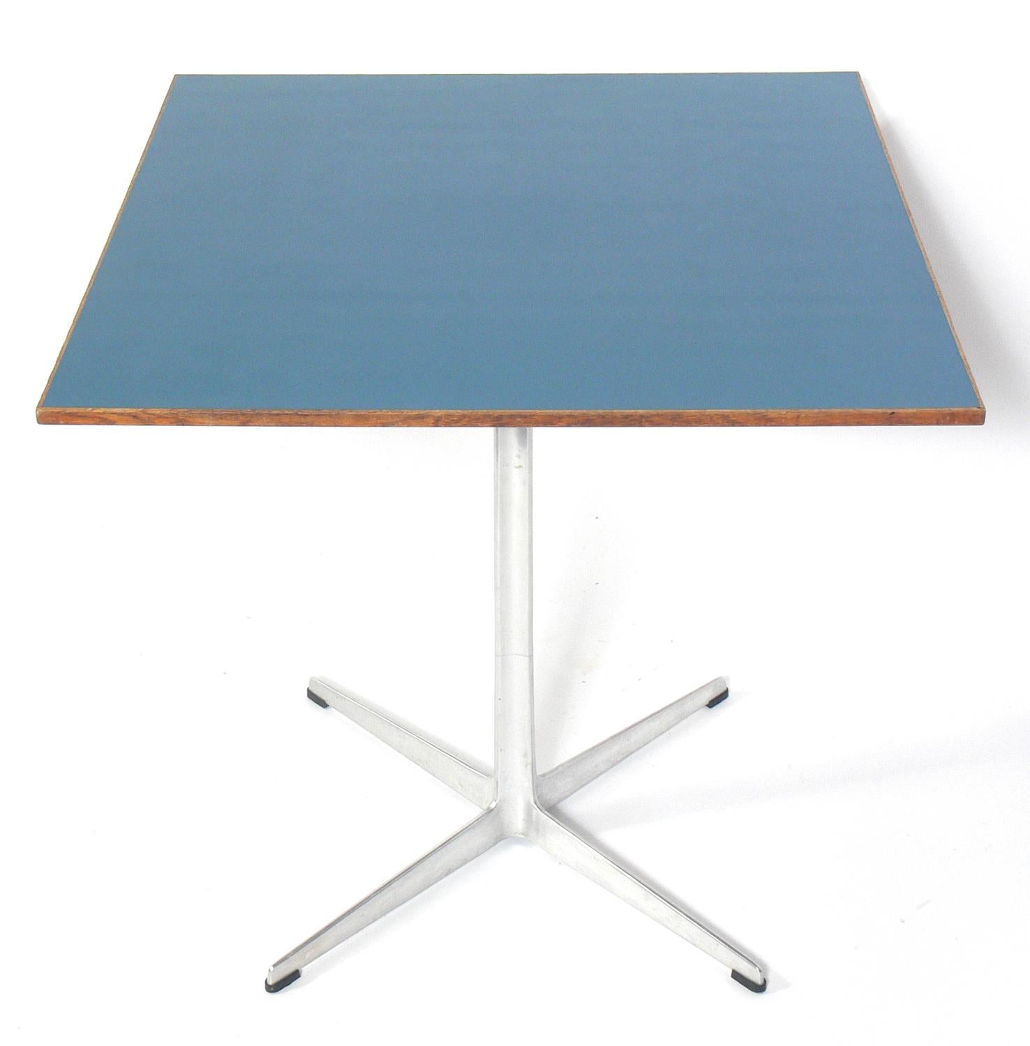 Danish Modern dining or breakfast table, designed by Arne Jacobsen for Fritz Hansen, circa 1960s. Signed with 