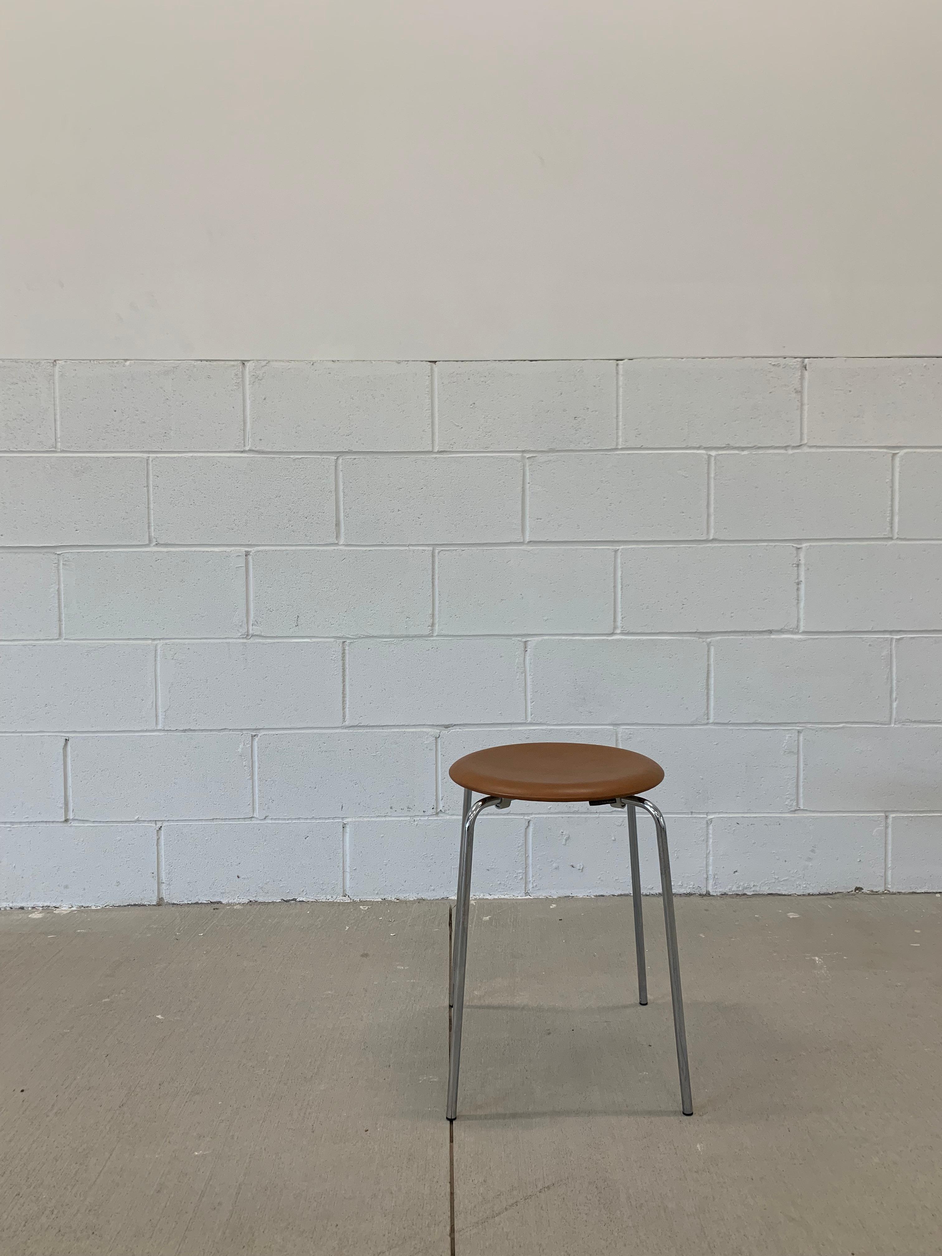 Dot stool in cognac elegance leather and chrome legs by Arne Jacobsen for Fritz Hansen.