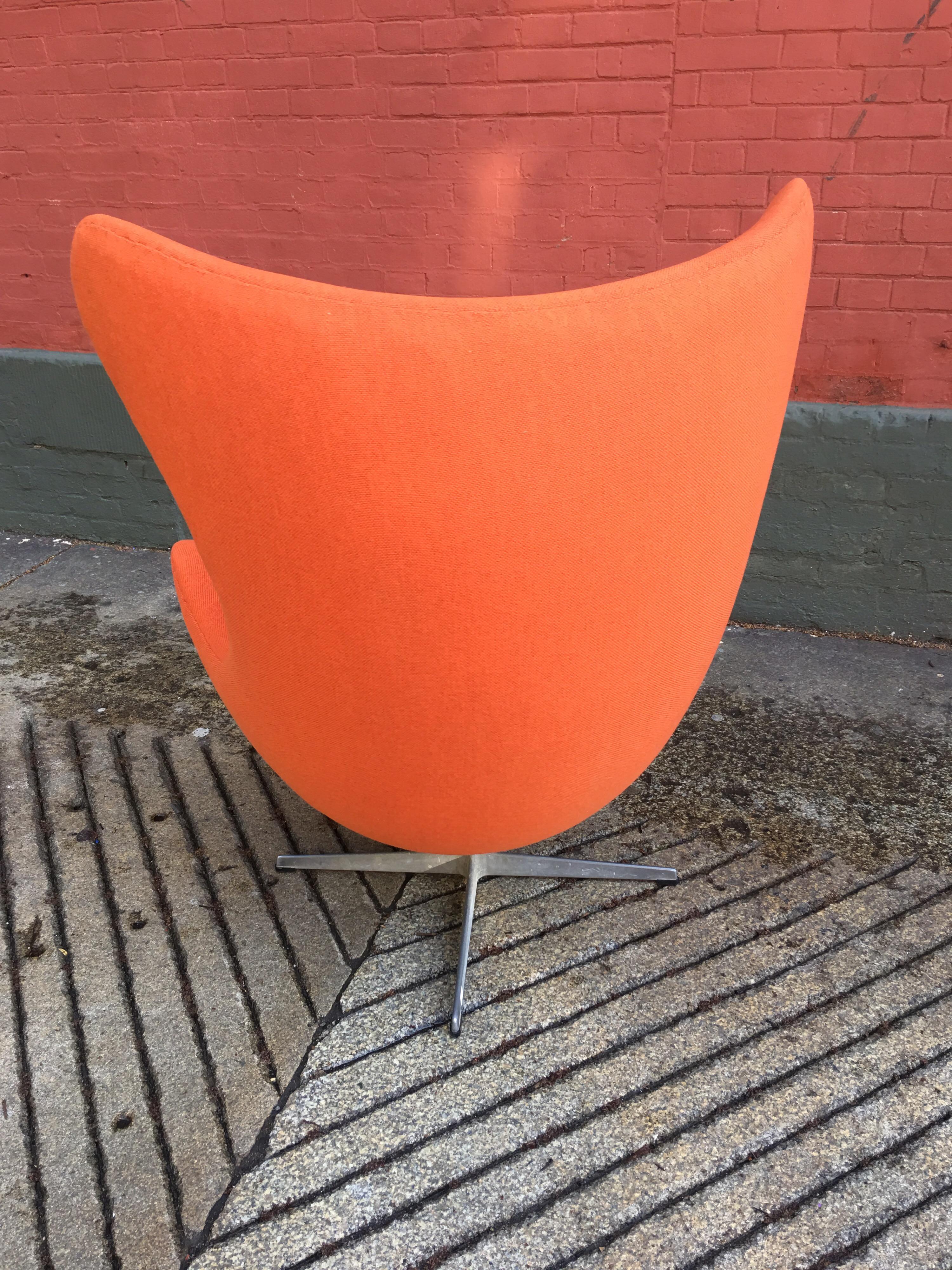 I have a stripped down Arne Jacobsen tilting and swiveling egg chair. Price is for chair upholstered in your fabric choice.   The Chair Pictured was the Companion Egg Chair which has been sold.  I do have enough Orange Fabric to do another one!