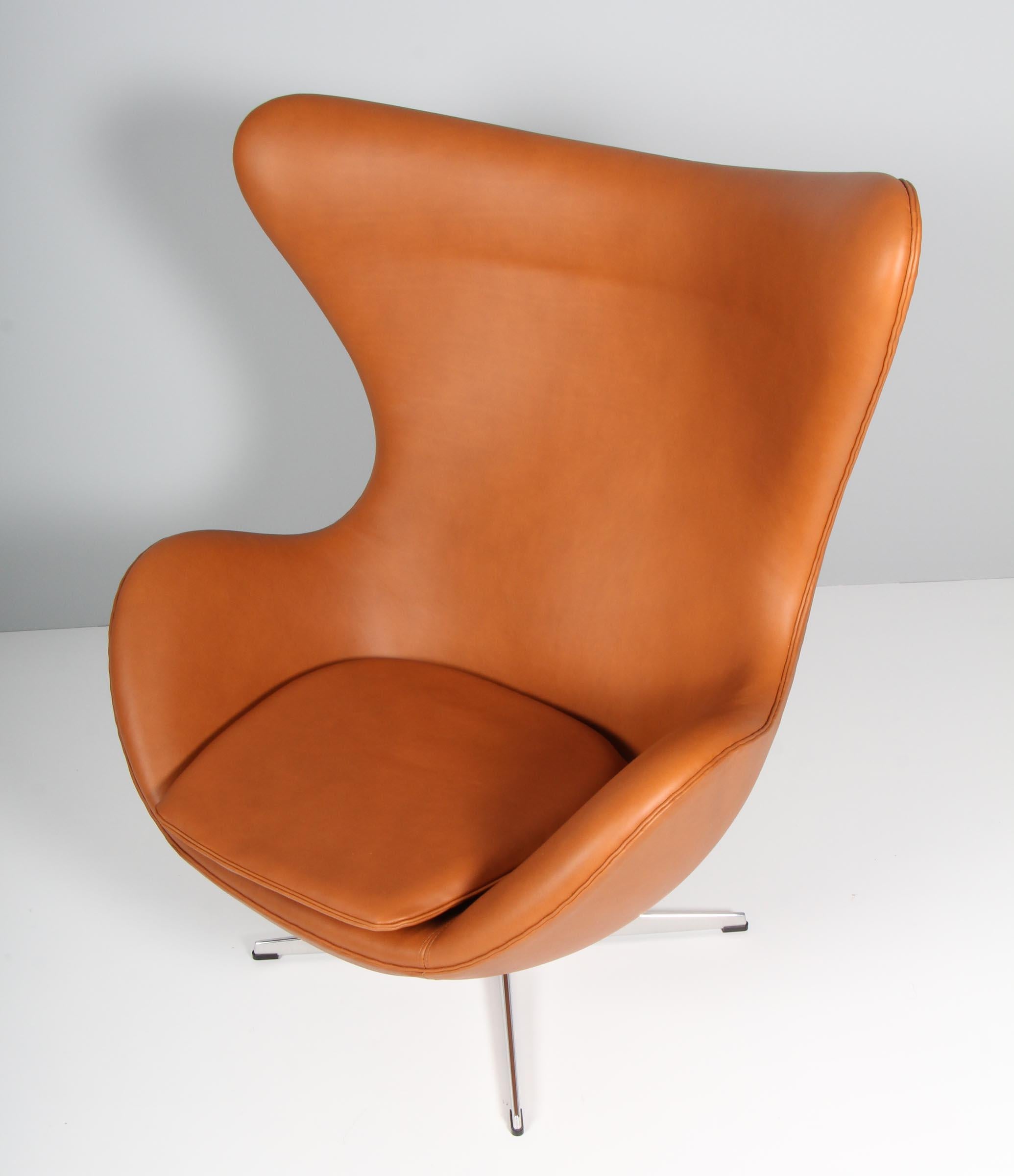Arne Jacobsen set of lounge chairs model Egg. New upholstered with Nevada cognac aniline leather.

Four star base.

Made by Fritz Hansen.

This iconic chair is one of the most famous chairs in the world and is recognized by design lovers in