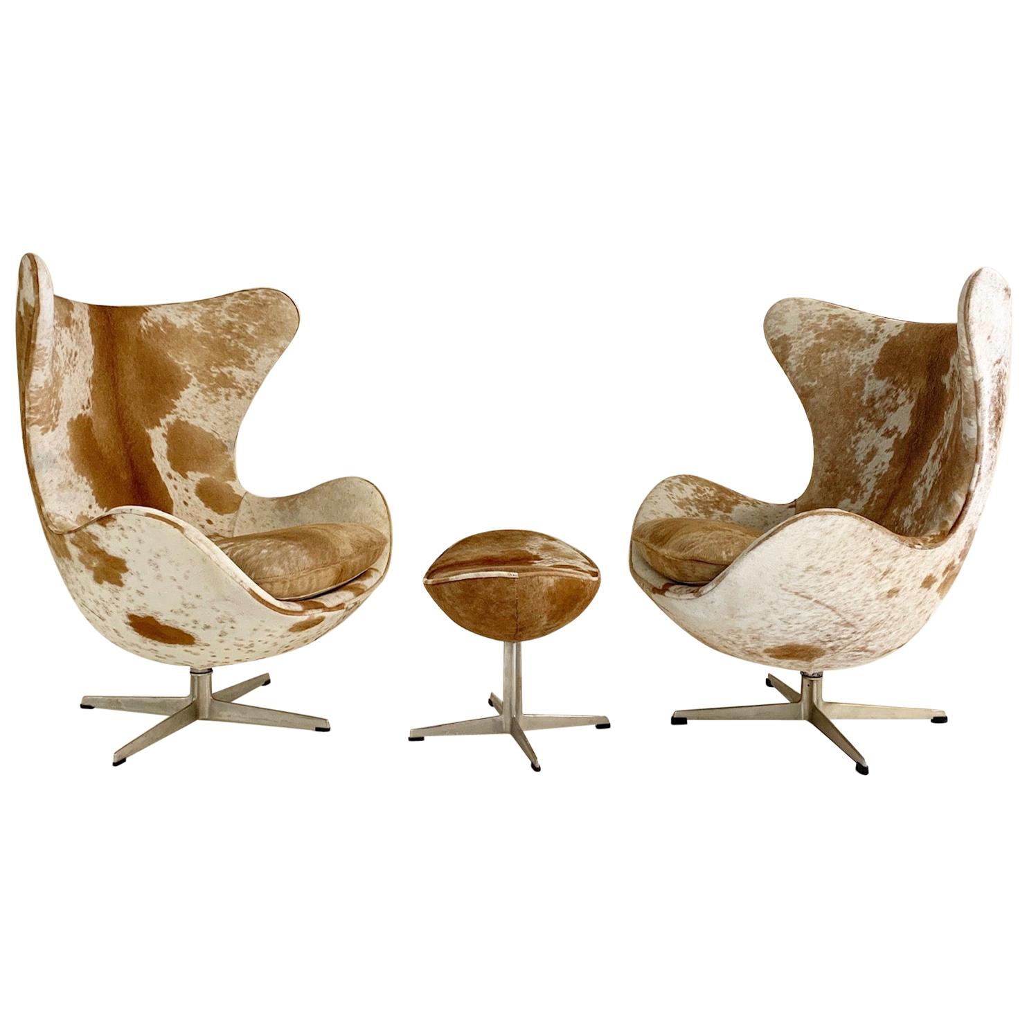Arne Jacobsen Egg Chairs and Ottoman in Brazilian Cowhide