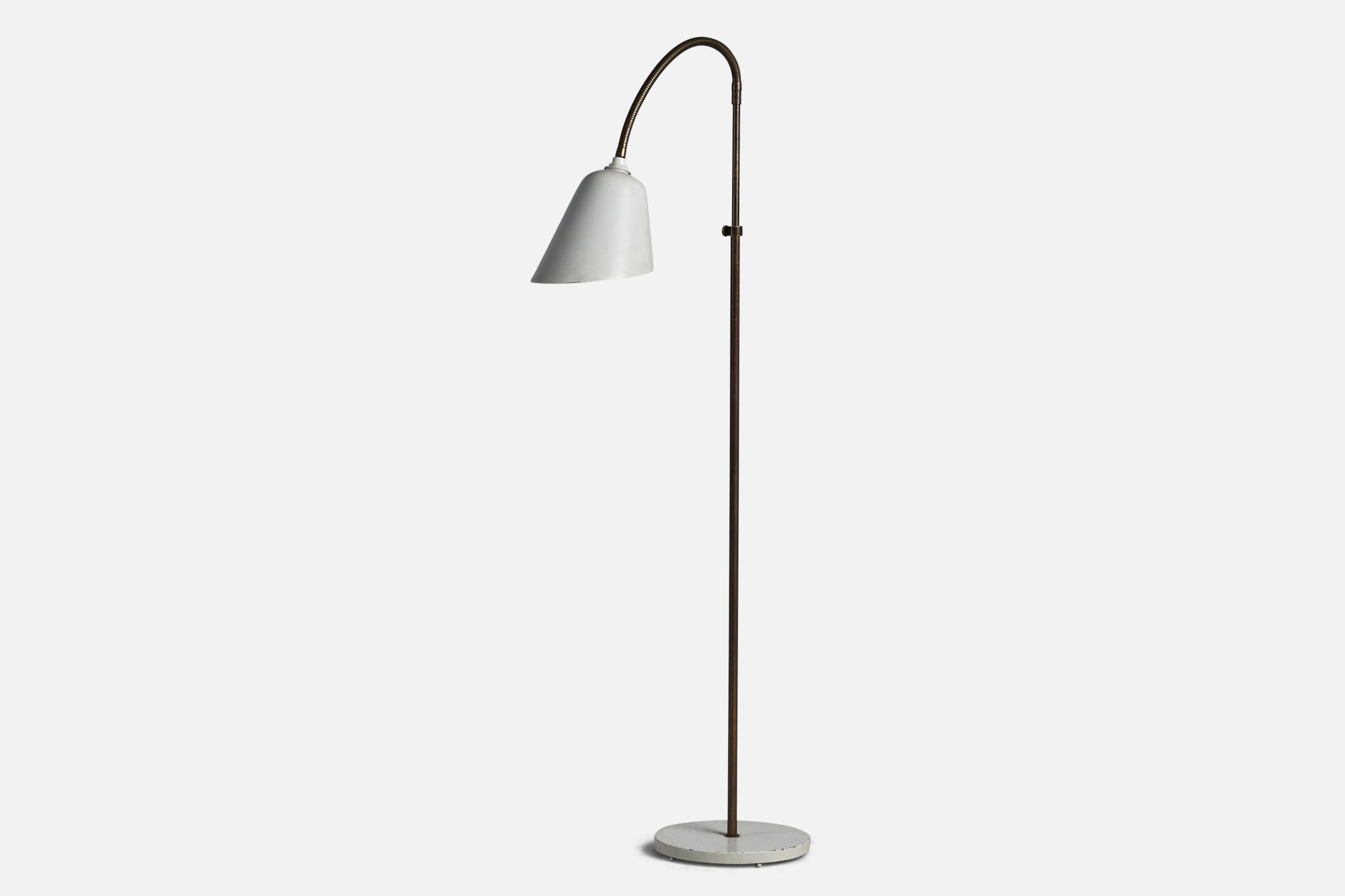 An adjustable brass and white-lacquered metal floor lamp designed by Arne Jacobsen and produced by Louis Poulsen, Denmark, c. 1930s.

Overall Dimensions (inches): 52.75” H x 7” W x 23” D
Bulb Specifications: E-14 Bulb
Number of Sockets: 1
All