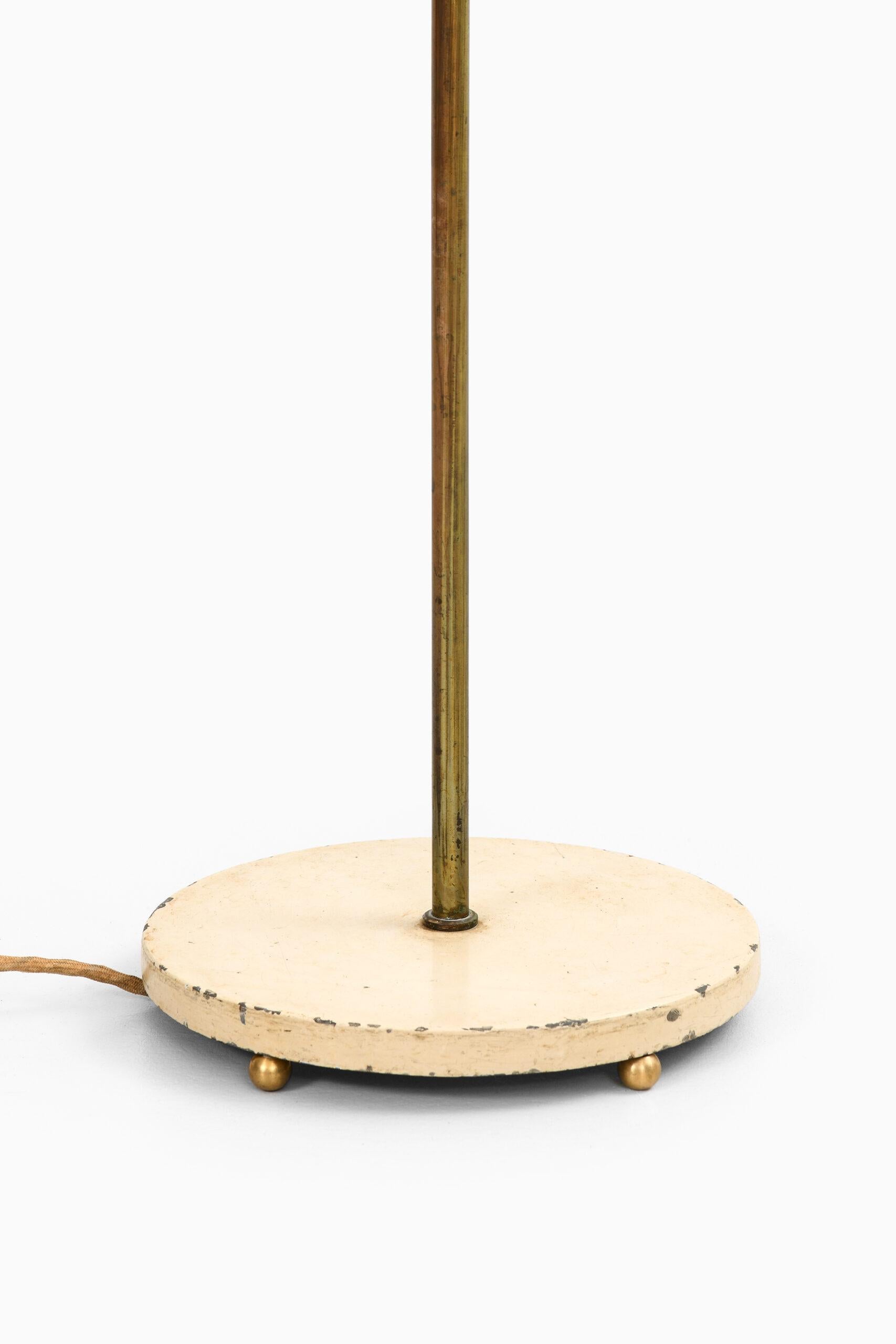 Very rare early floor lamp designed by Arne Jacobsen. Produced by Louis Poulsen in Denmark.