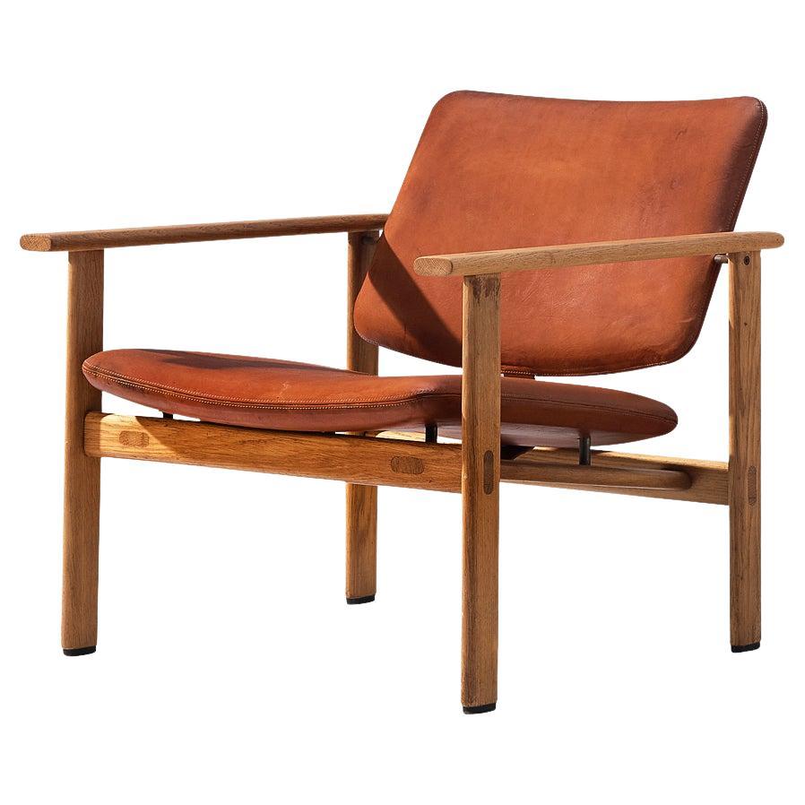 Arne Jacobsen for Fritz Hansen Easy Chair in Oak and Cognac Leather For Sale