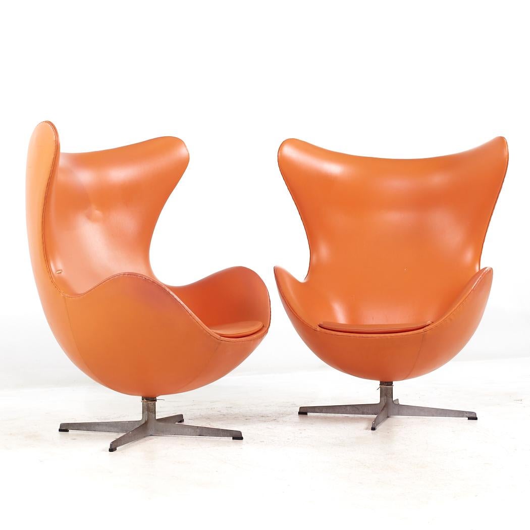 Arne Jacobsen for Fritz Hansen Mid Century Egg Chairs - Pair

Each egg chair measures: 35 wide x 31 deep x 42.25 high, with a seat height of 14.5 and arm height/chair clearance 22.75 inches
All pieces of furniture can be had in what we call restored