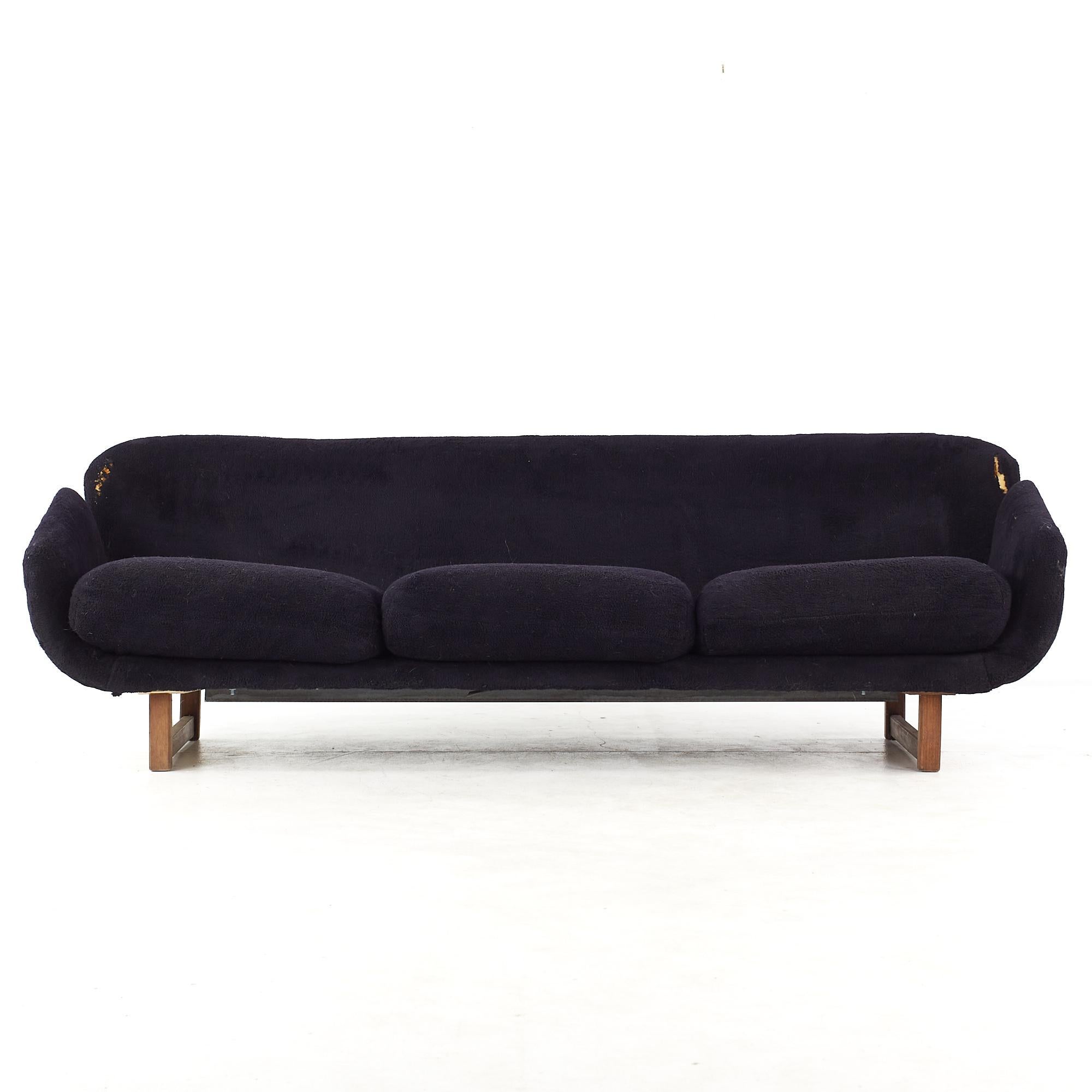 Arne Jacobsen for Fritz Hansen Style Mid Century Swan Sofa

This sofa measures: 84 wide x 33 deep x 27 inches high, with a seat height of 16 and arm height of 20 inches

All pieces of furniture can be had in what we call restored vintage condition.
