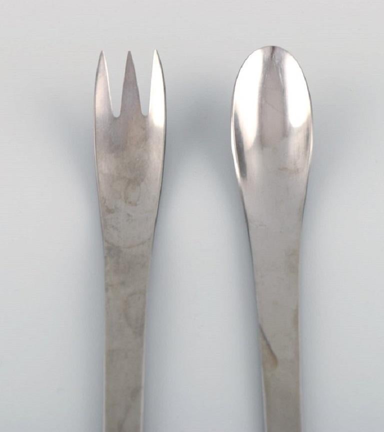 Arne Jacobsen for Georg Jensen. Modernist AJ cutlery. Salad set in stainless steel. Late 20th century.
Length: 32 cm.
In excellent condition.
Stamped.