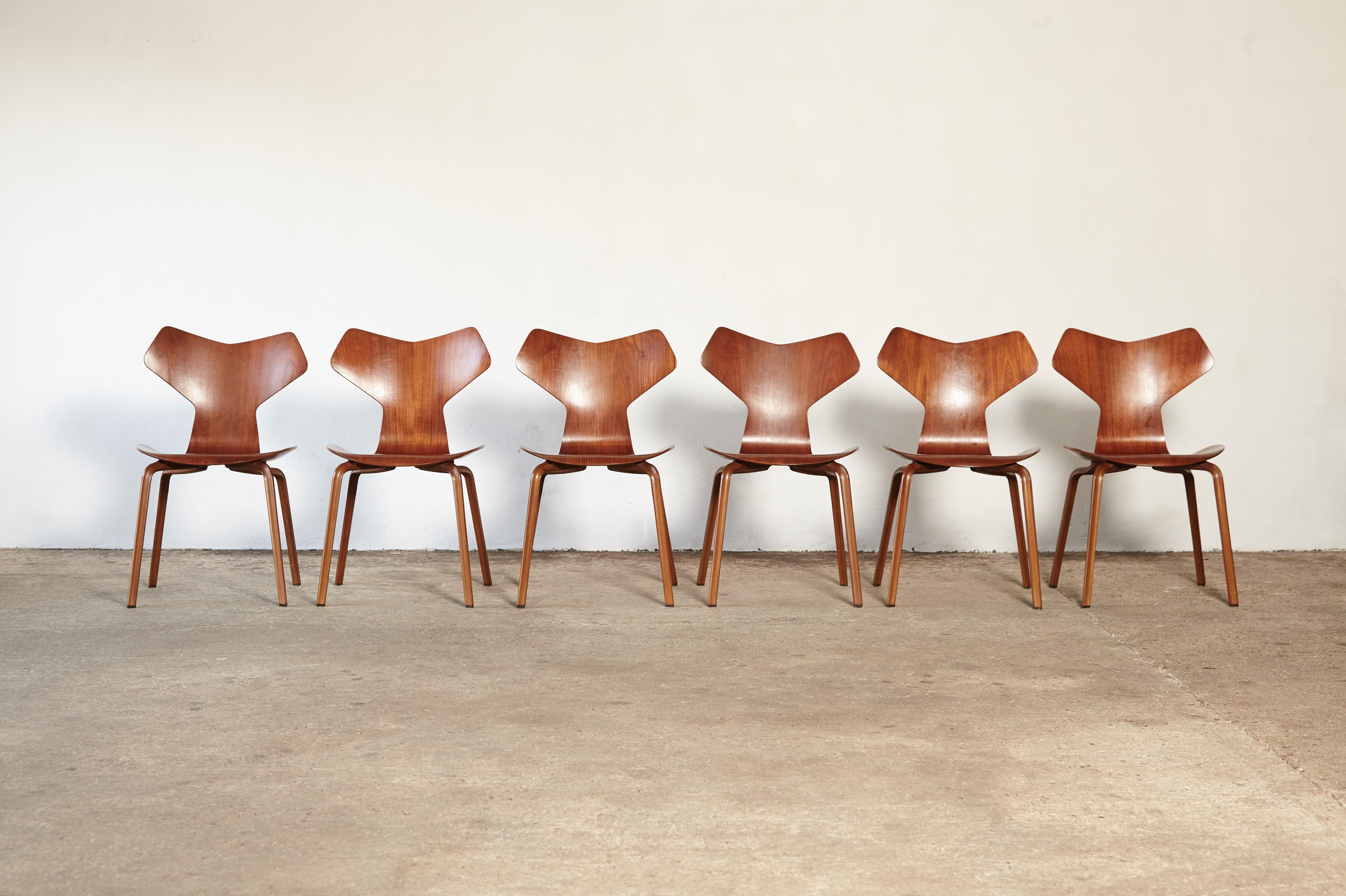 A stunning set of six Arne Jacobsen Grand Prix chairs, Fritz Hansen, Denmark, 1960s. Back and seats of molded teak laminate, with profiled teak legs. Stamped with makers mark, made by FH Denmark. Overall excellent condition.  Ships worldwide.




UK