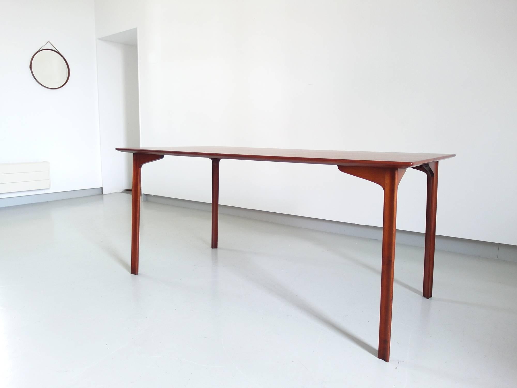 Grand Prix teak dining table designed by Arne Jacobsen in 1960. Produced by Fritz Hansen. This rare table was designed to be the companion for the Grand Prix chairs.
The table is called the Grand Prix table, after the model 3130 chair that won the