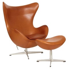 Arne Jacobsen Leather Egg Chair and Ottoman, circa 1990s