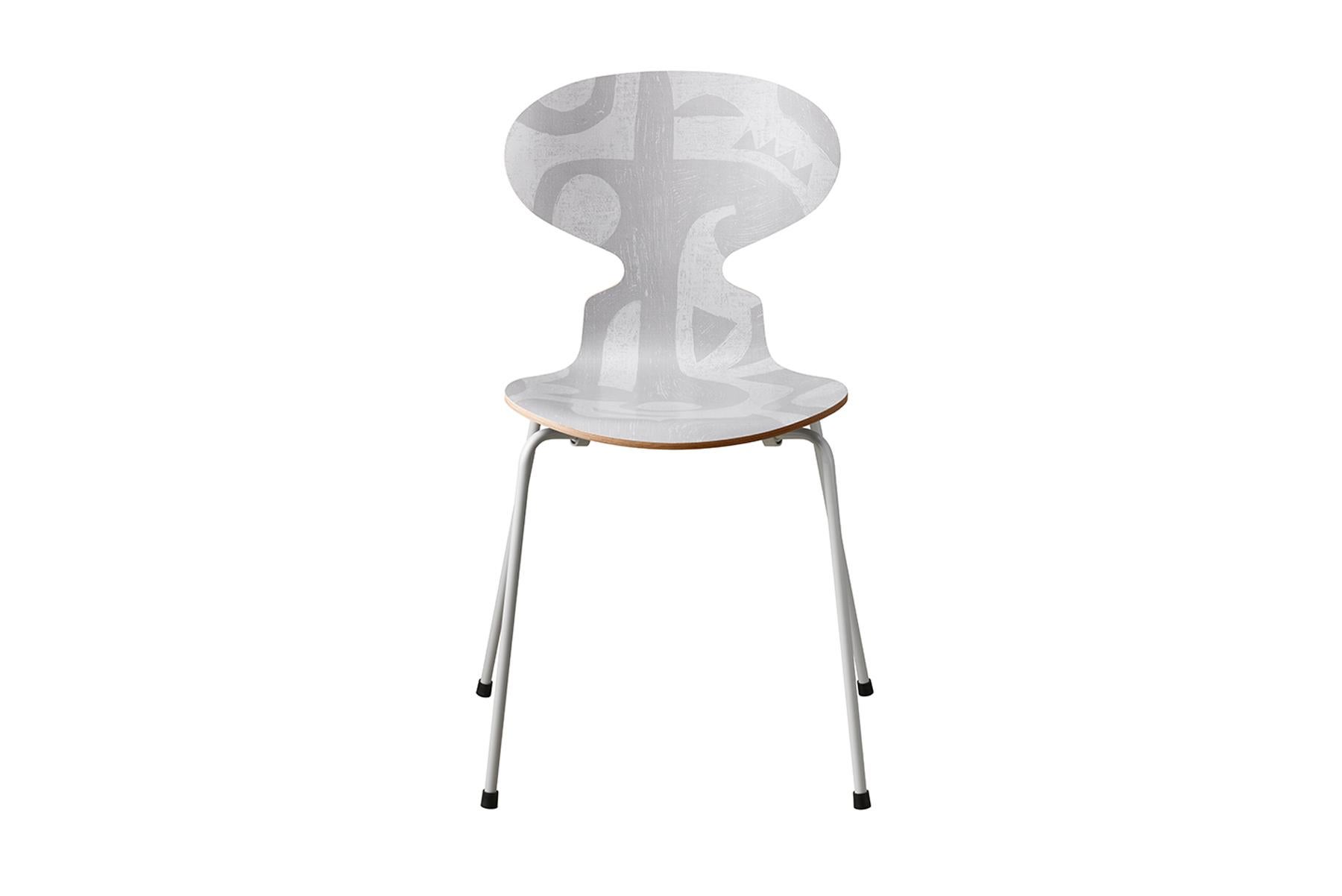 Arne Jacobsen’s chair design is named for the outline of an ant with its head raised. Despite its slender shape, Ant is strong and famously comfortable. Ant Deco silhouette is the first printed version of the chair ever released and features a print