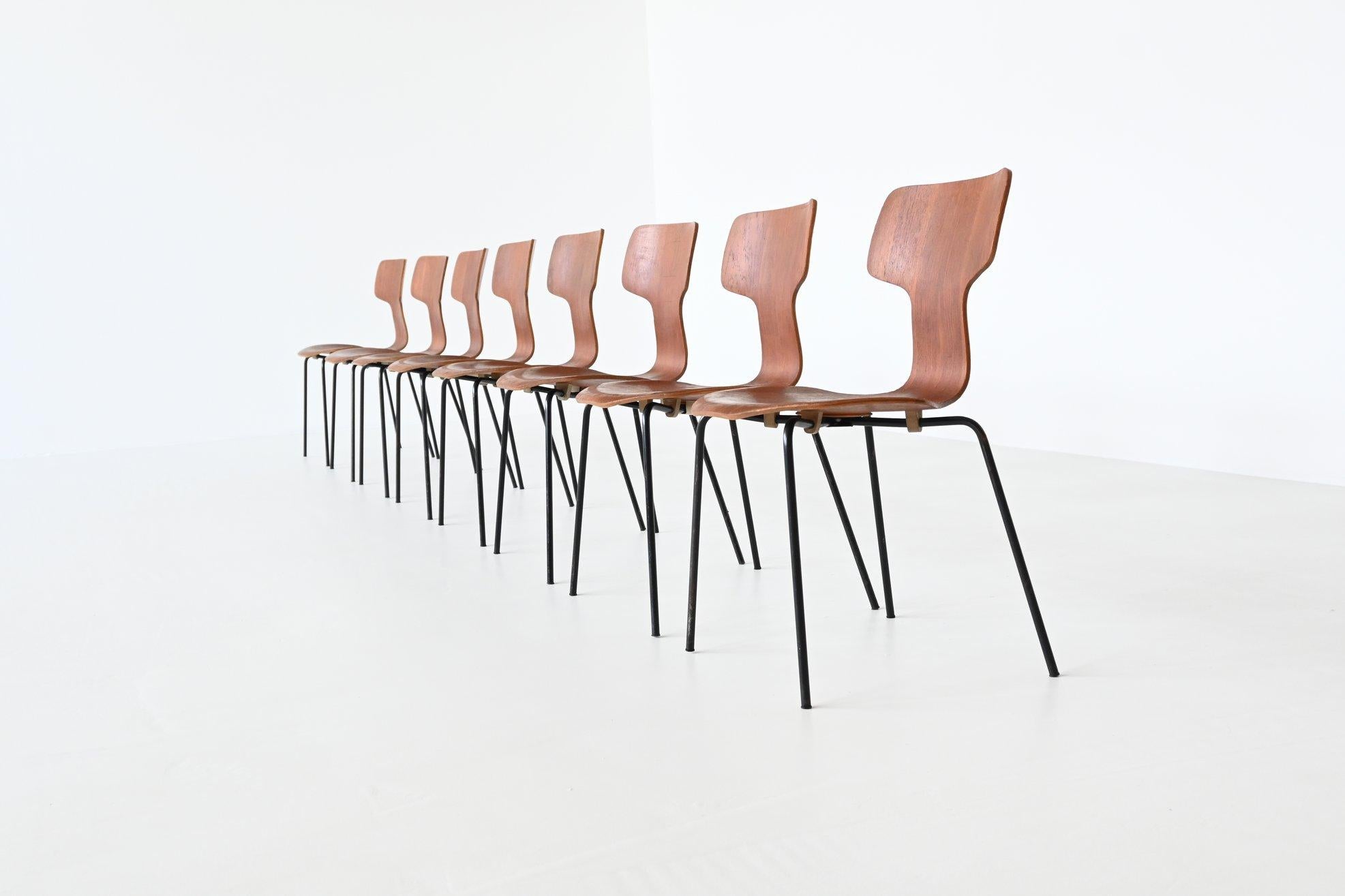 Iconic and beautiful shaped model 3103 “Hammer” dining chairs designed by Arne Jacobsen and manufactured by Fritz Hansen, Denmark 1969. These well-crafted chairs are made of moulded plywood and finished with nicely grained teak veneer. They have