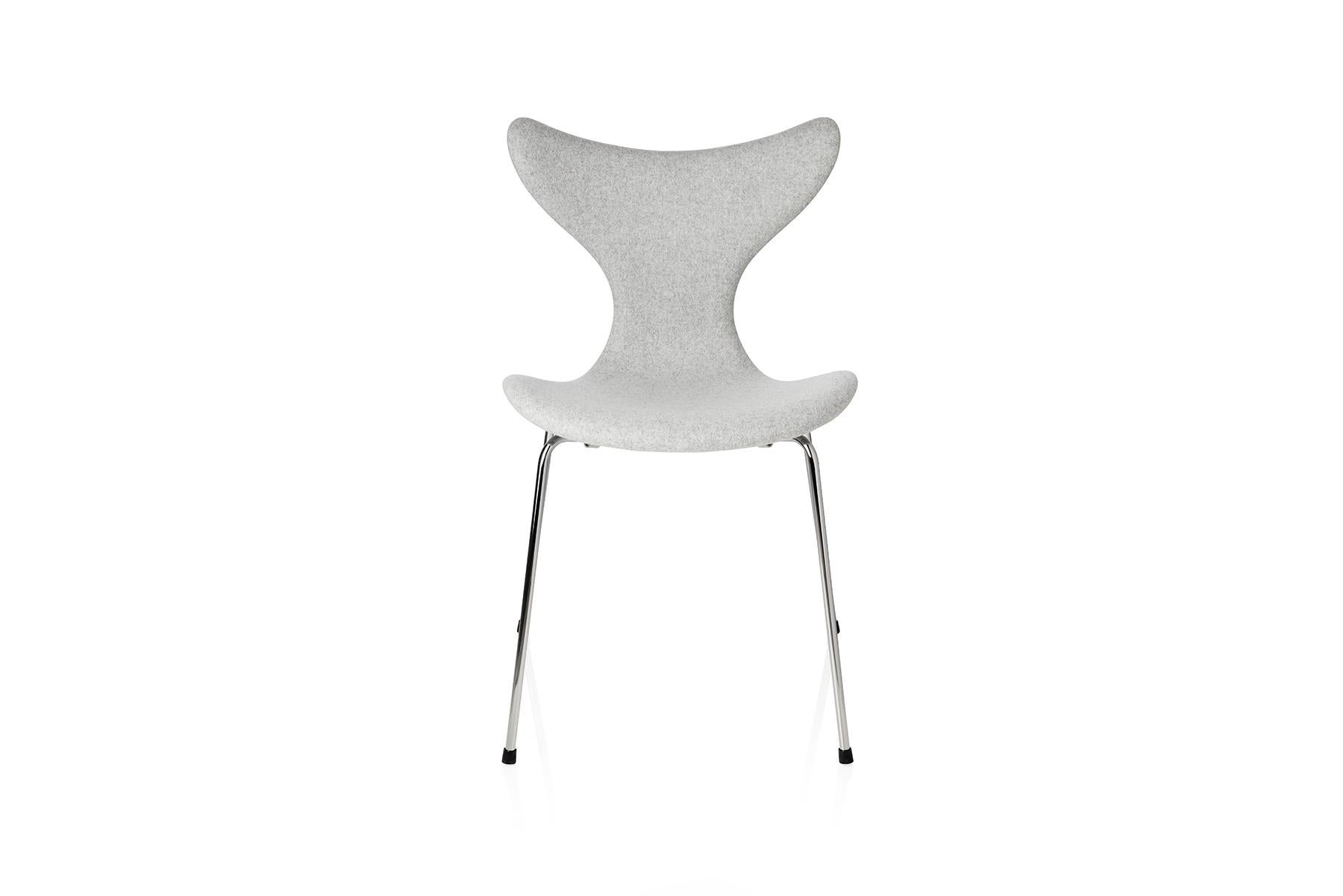 This series 8 chair was originally designed for the Danish National Bank. It is often referred to as the Lily™. The first model was 3108 from 1968, and the chair was introduced to the market with arms, model 3208, at the Danish Furniture Fair in