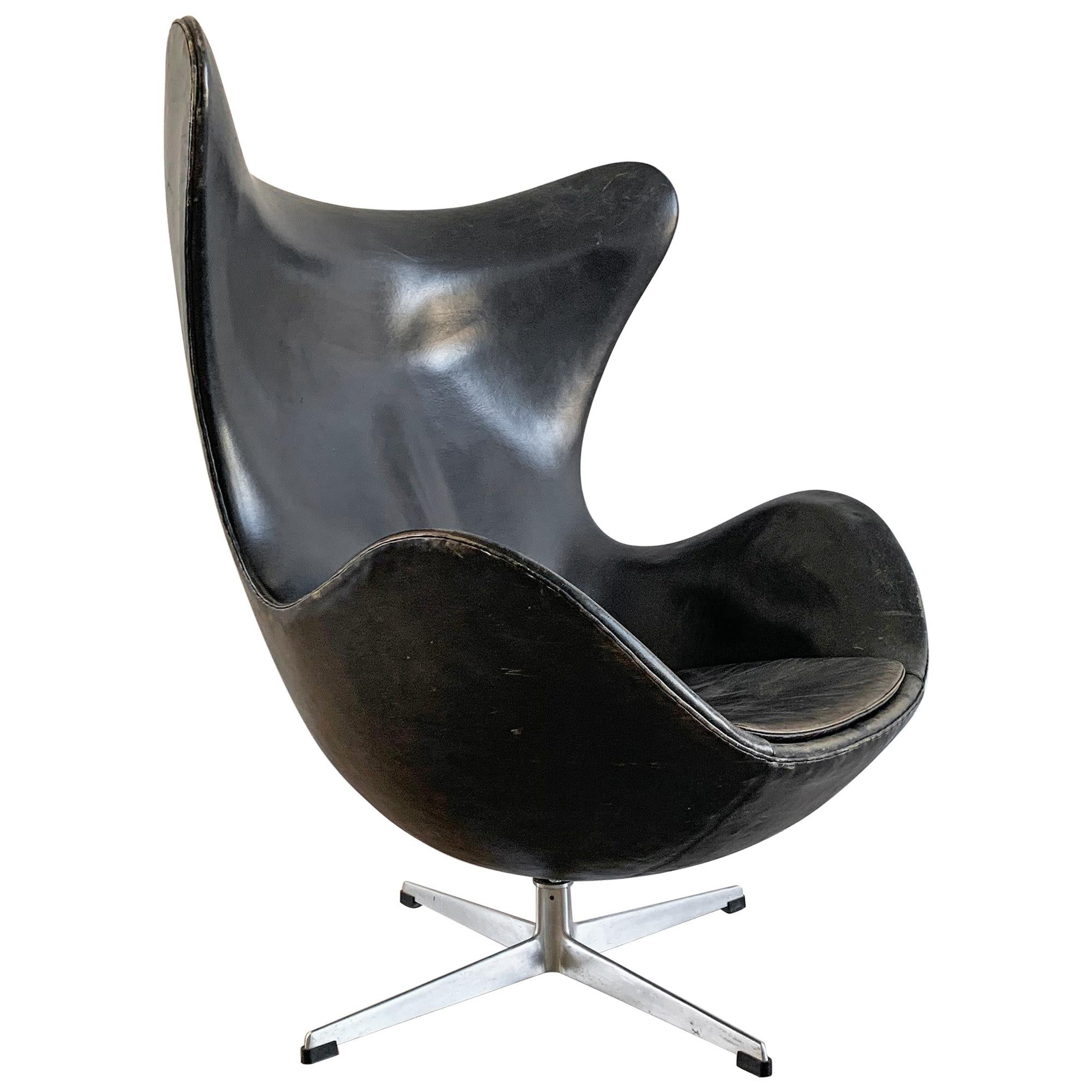 Arne Jacobsen for Fritz Hansen Patinated Black Leather Egg Chair,  Signed 1963