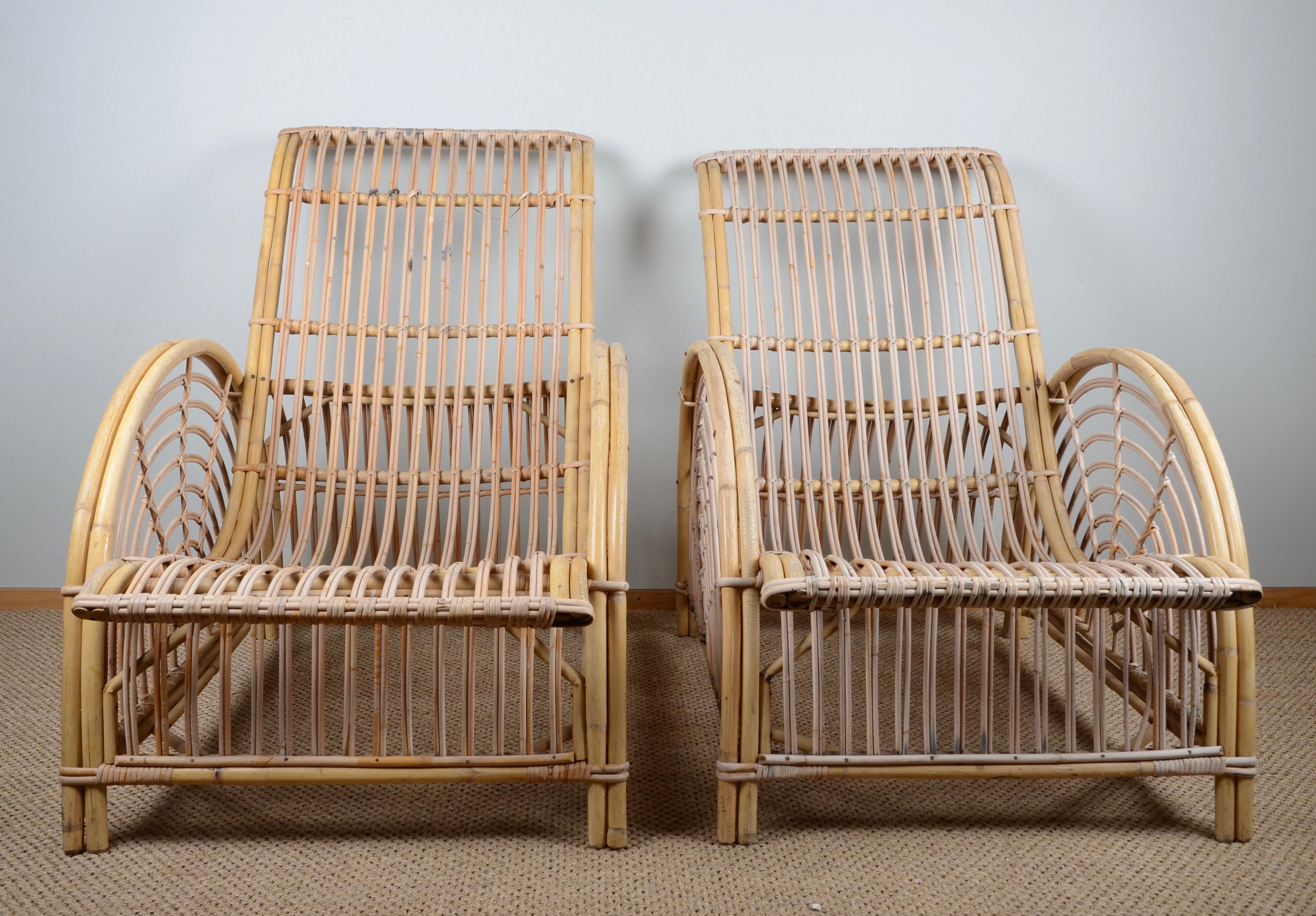 A pair of rattan chairs, model Paris / AJ-11. Designed in 1925 by Arne Jacobsen, his first furniture design. These are manufactured circa 1960s.

 