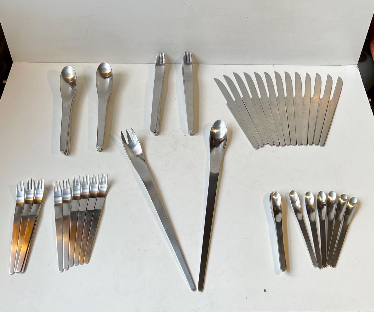 Complete flatware service for 12 persons designed by Arne Jacobsen and manufactured by Georg Jensen in Denmark. It was designed all the way back in 1957 for SAS Royal Hotel in Copenhagen. This set of 66 parts consists of: 13 dinner knives, 13 dinner